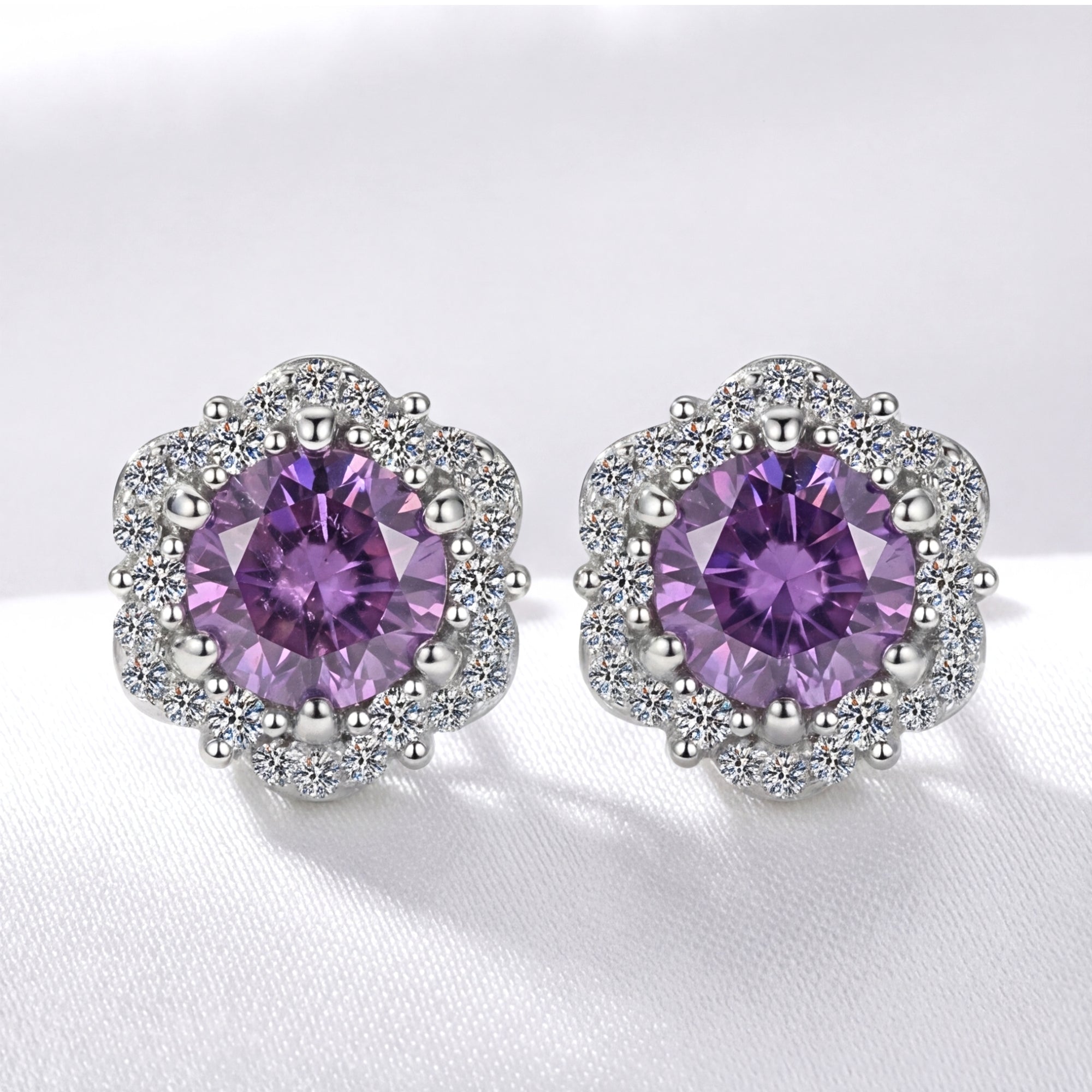 Round cut simulated amethyst floral halo stud earrings in S925 sterling silver, front view on white background.