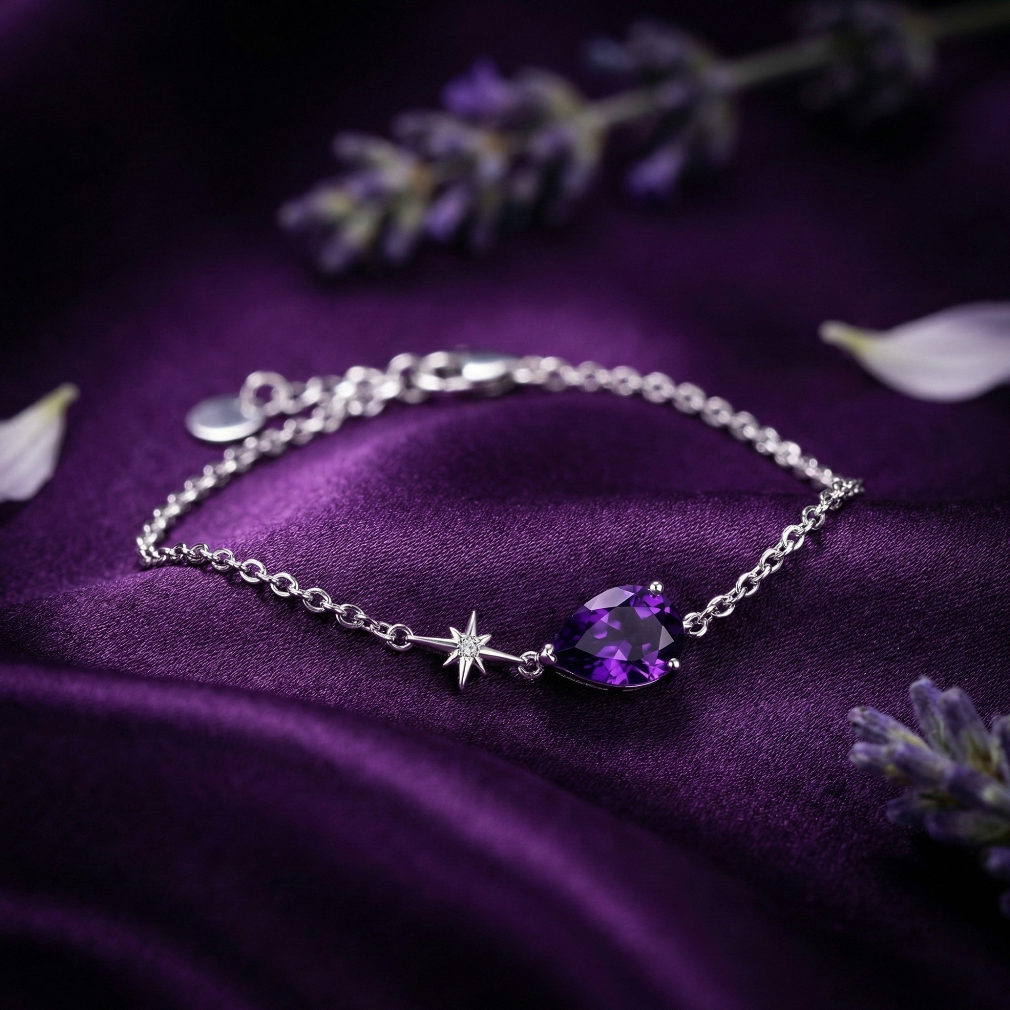 S925 sterling silver bracelet featuring a 1.6CT pear cut natural amethyst and star accent on silk.