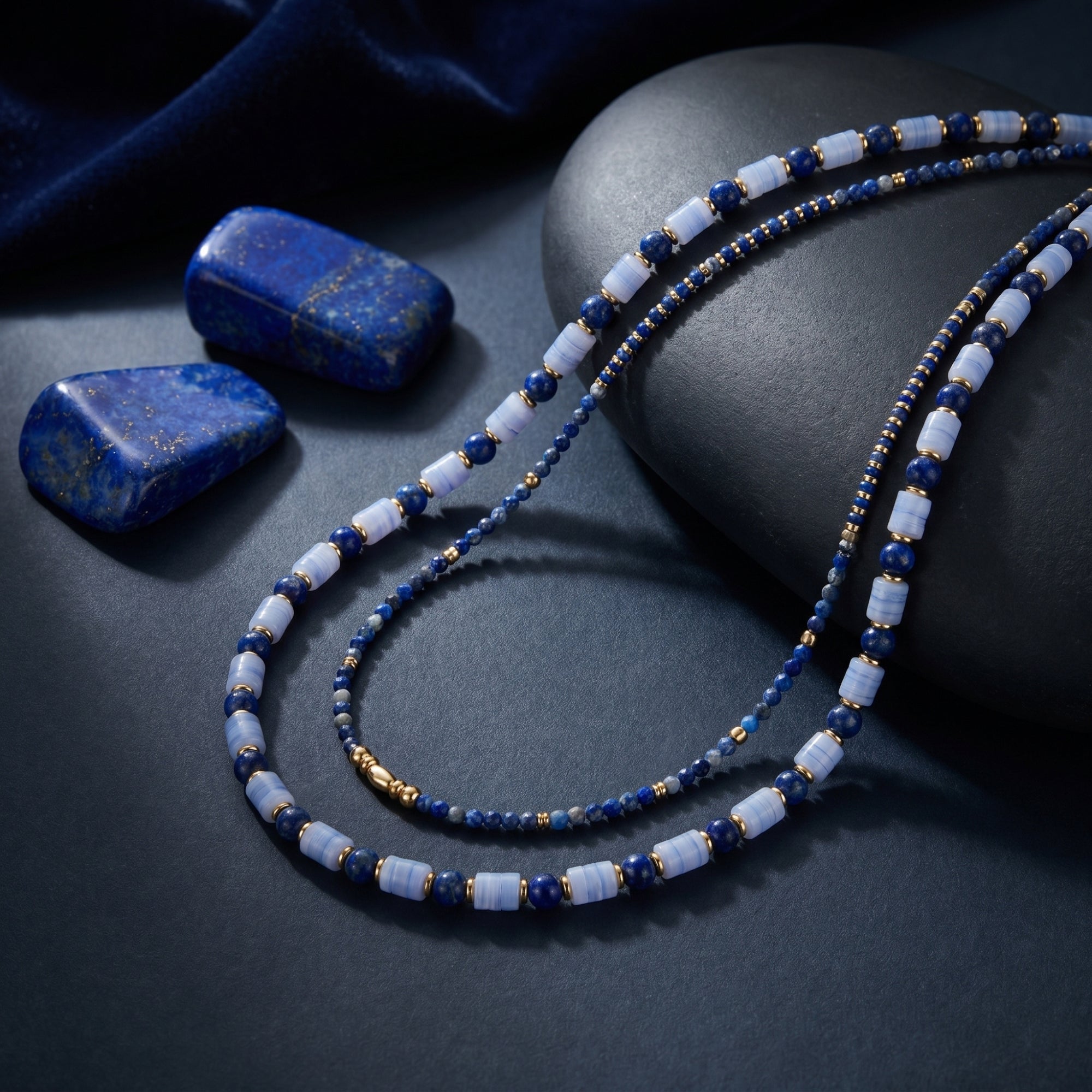 Detail shot of natural lapis lazuli beads and light blue barrel stones with 18k gold plated spacers.