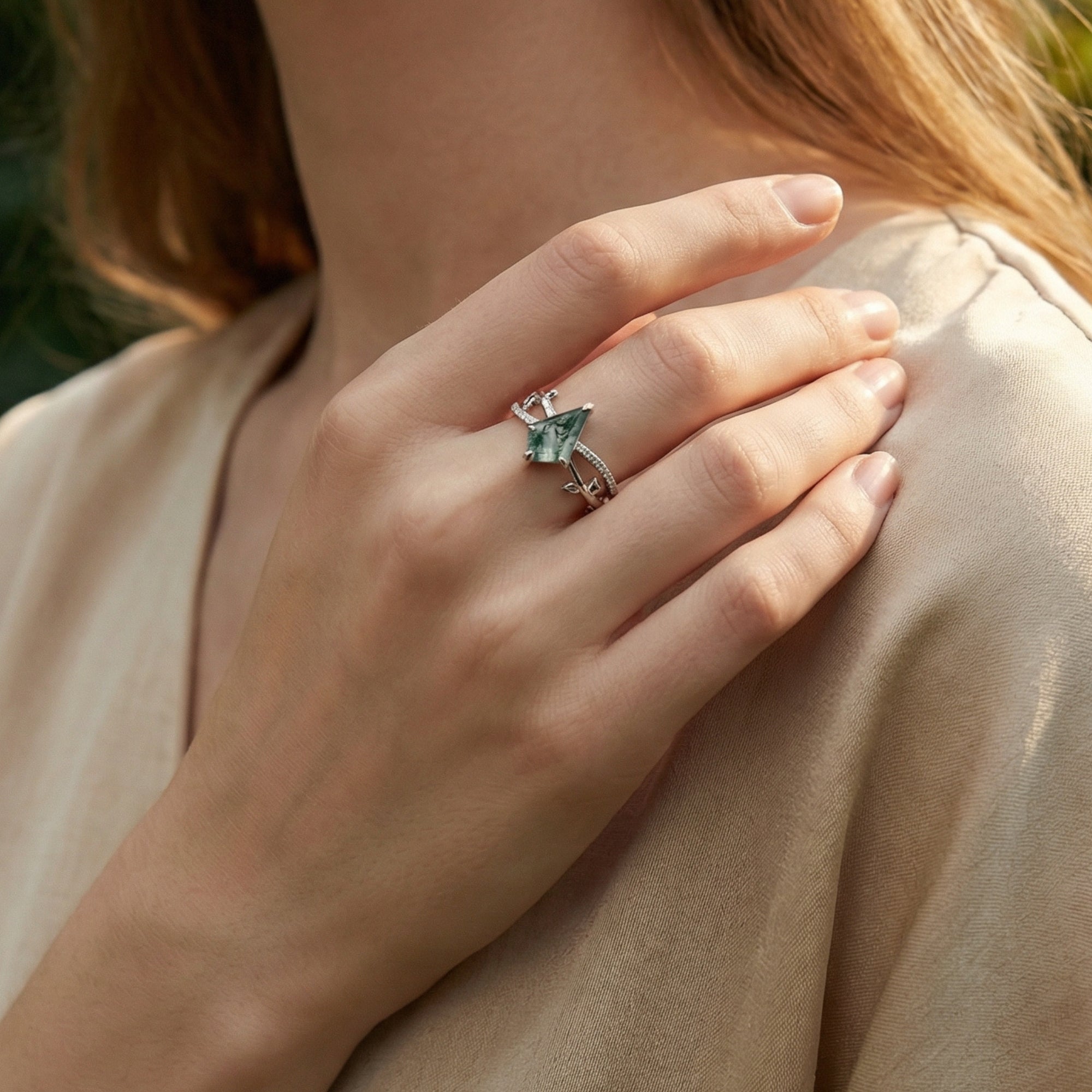 Kite cut moss agate sterling silver ring on a model's hand, highlighting the nature-inspired design.