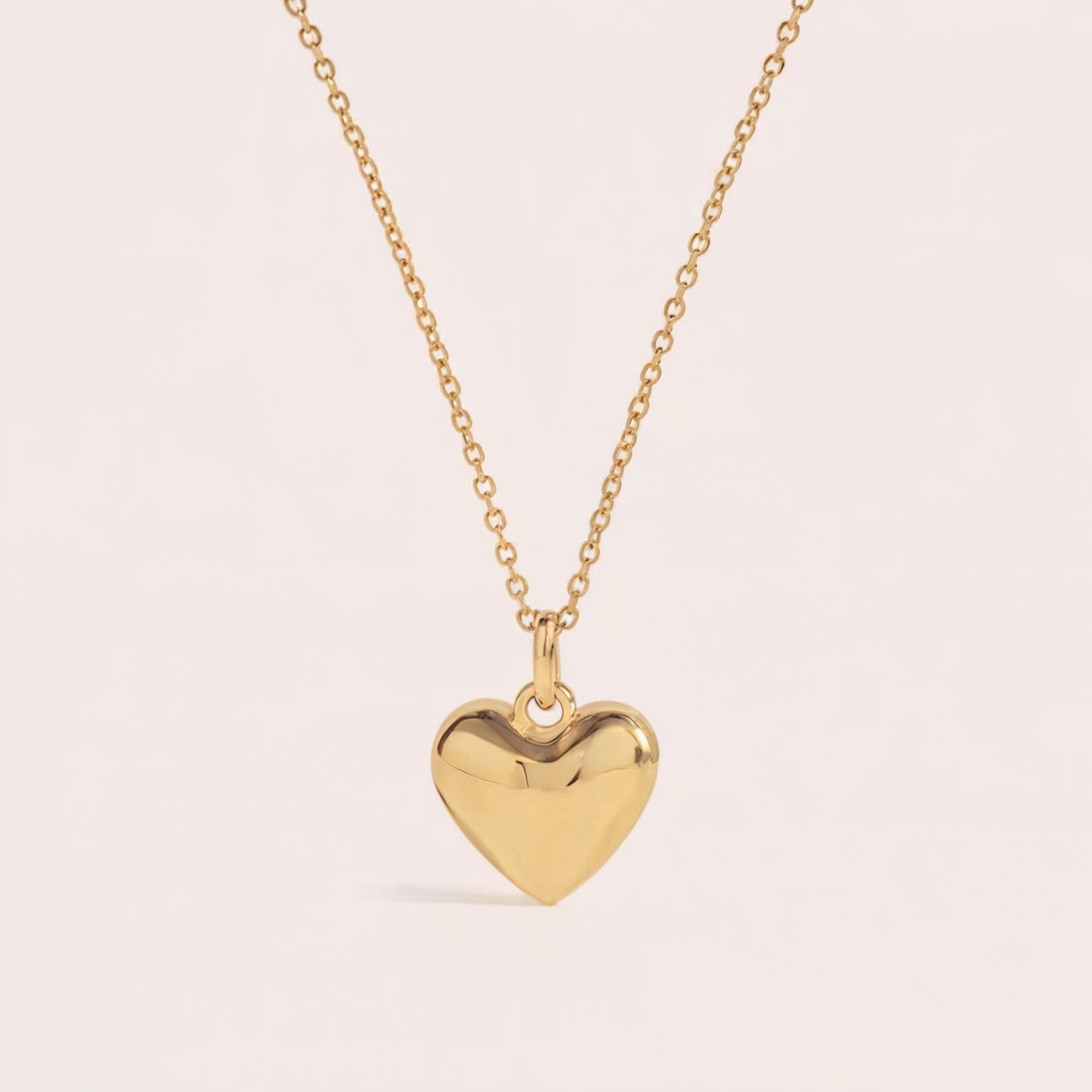 The Leva chunky heart solid gold necklace with 10mm pendant on an adjustable chain