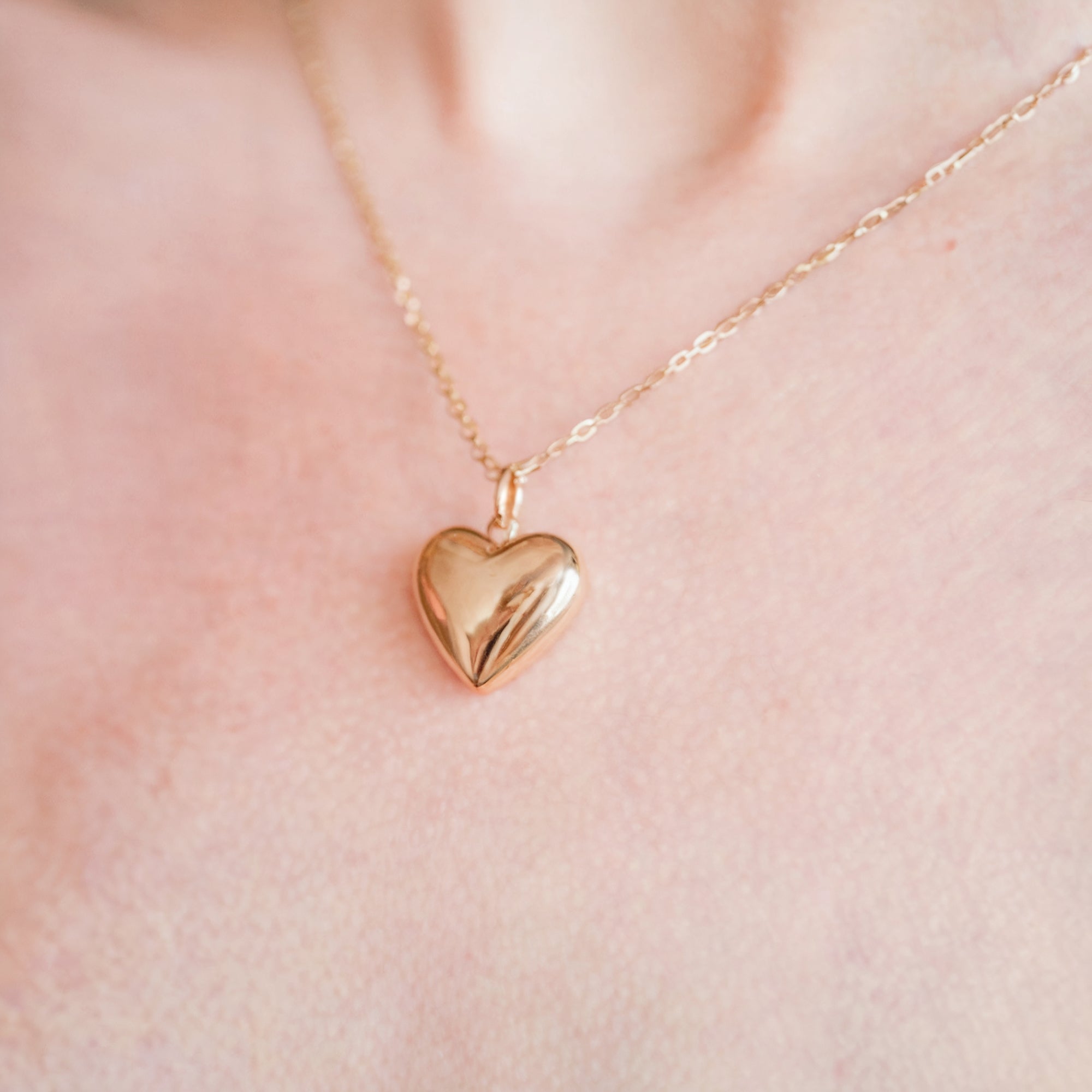 The 10mm by 10mm chunky heart pendant on a solid gold necklace