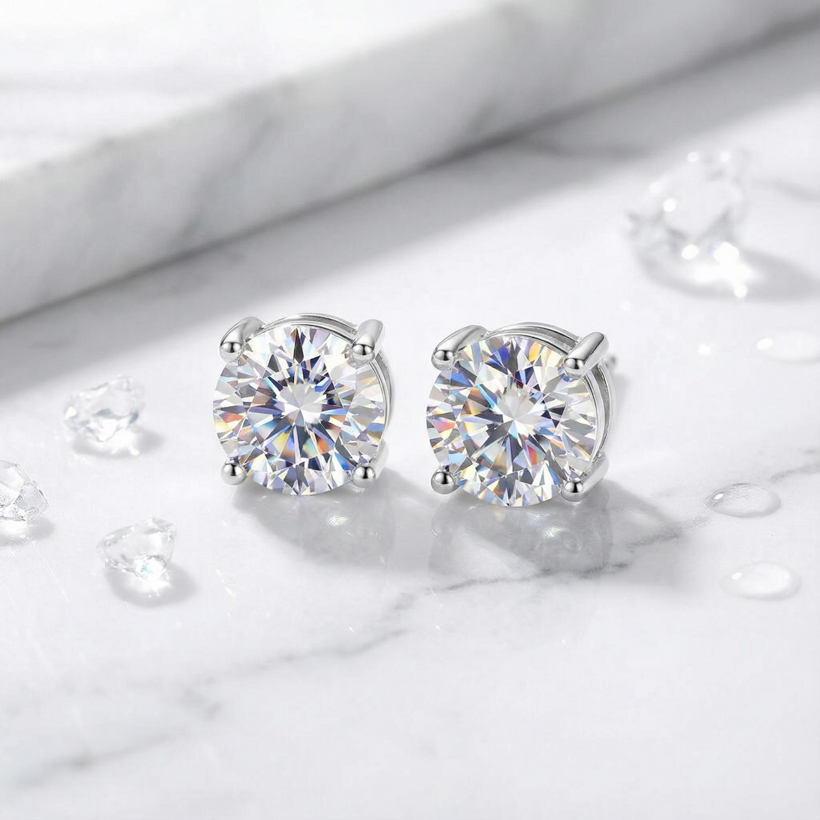 Round-cut A5 Zirconia stud earrings in S925 sterling silver on a white marble surface.