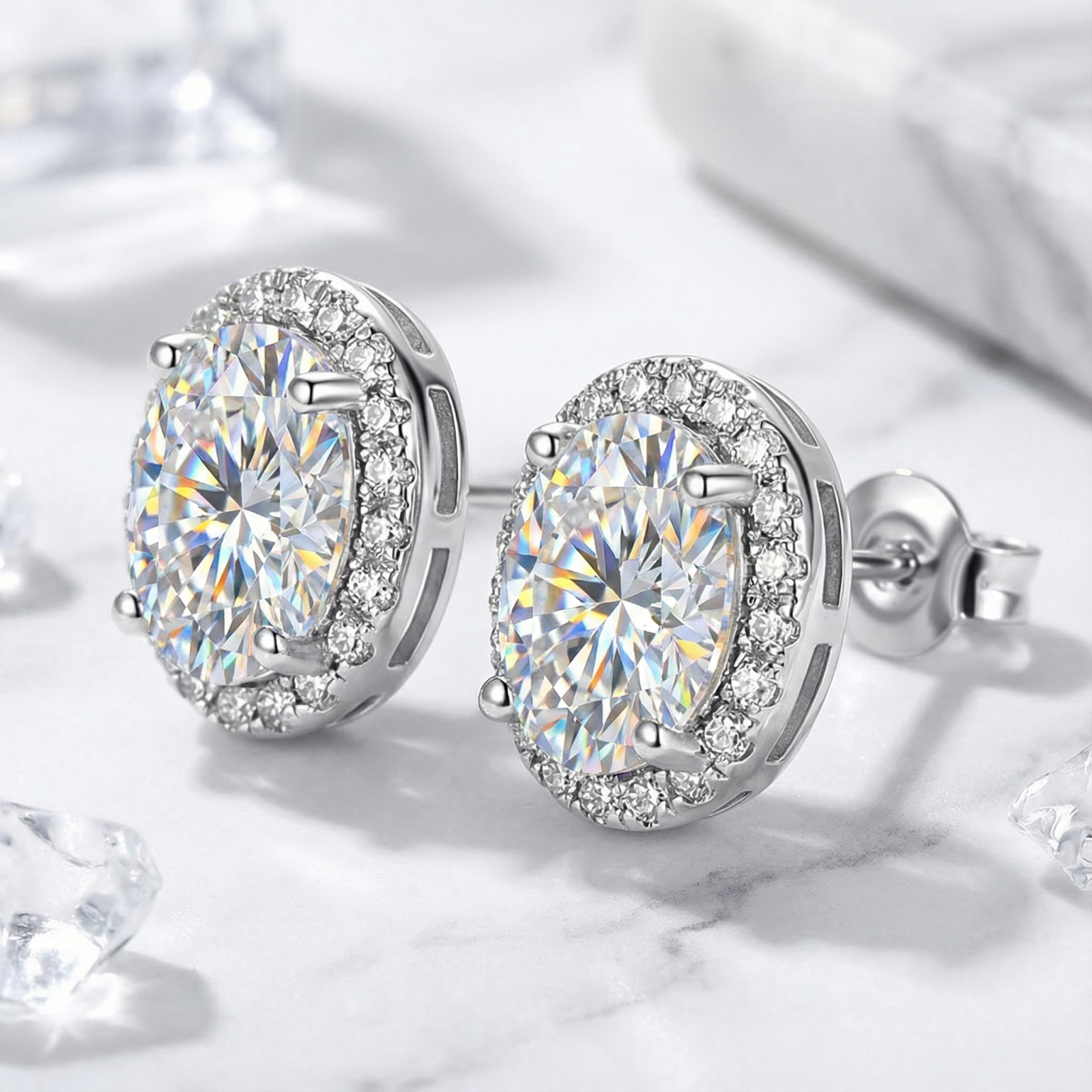 Close-up of sterling silver halo stud earrings with round cut zirconia, showing the side setting and back.