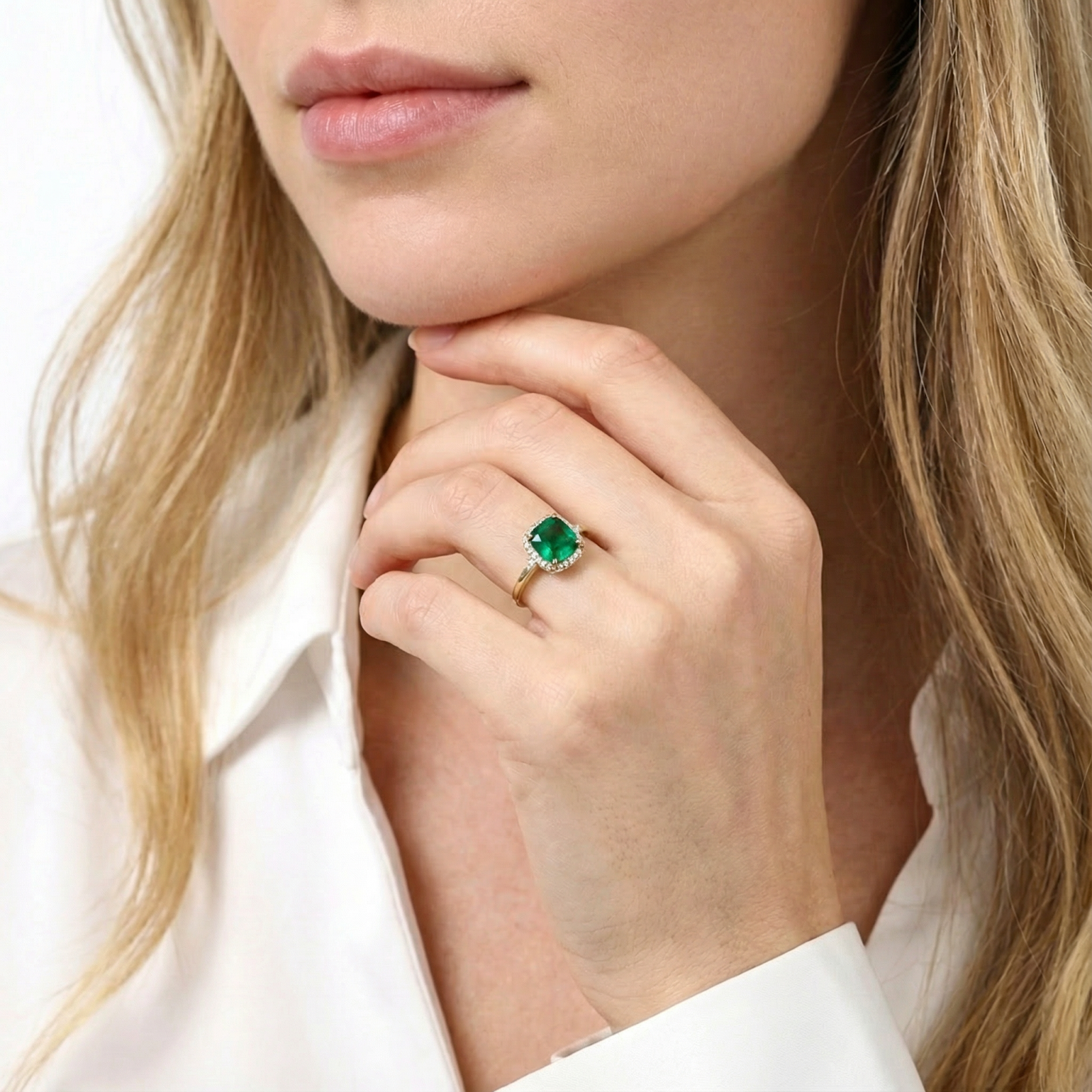 Model wearing the 18K gold vermeil cushion-cut simulated emerald ring with a white shirt.