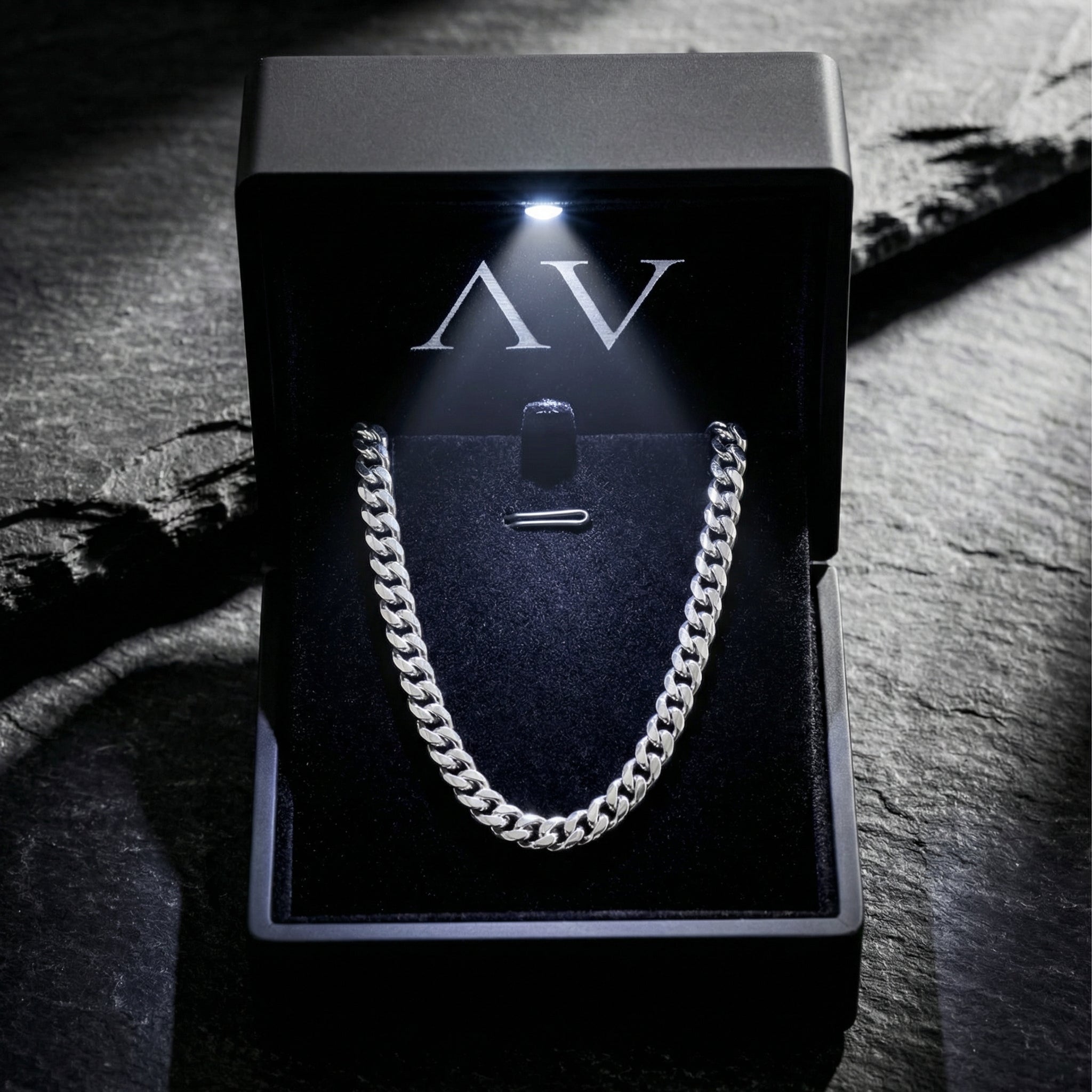 Silver 4mm Miami Cuban chain presented in a premium black LED-lit jewelry gift box with AV branding.
