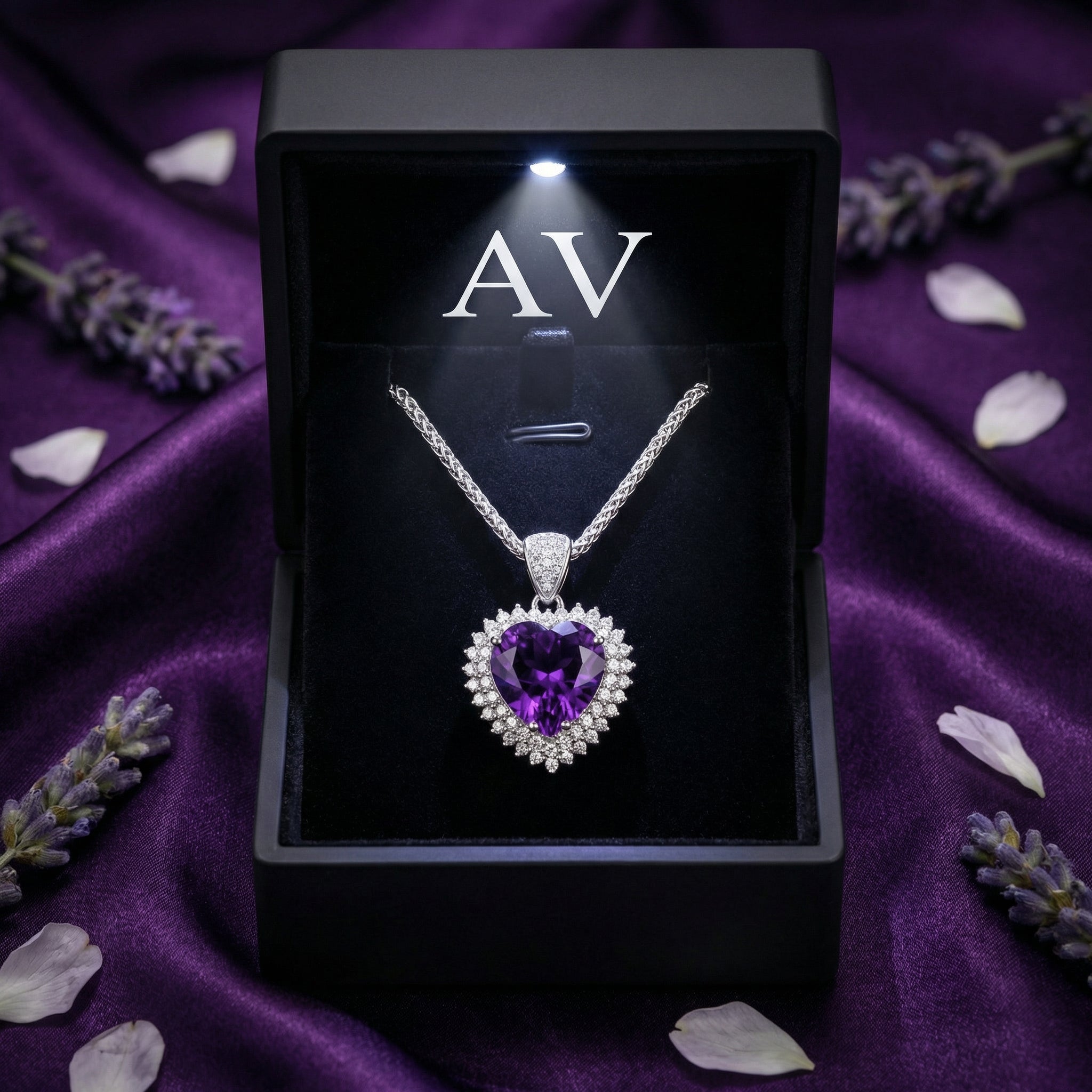 Heart cut amethyst necklace in S925 sterling silver inside a black LED-lit gift box.