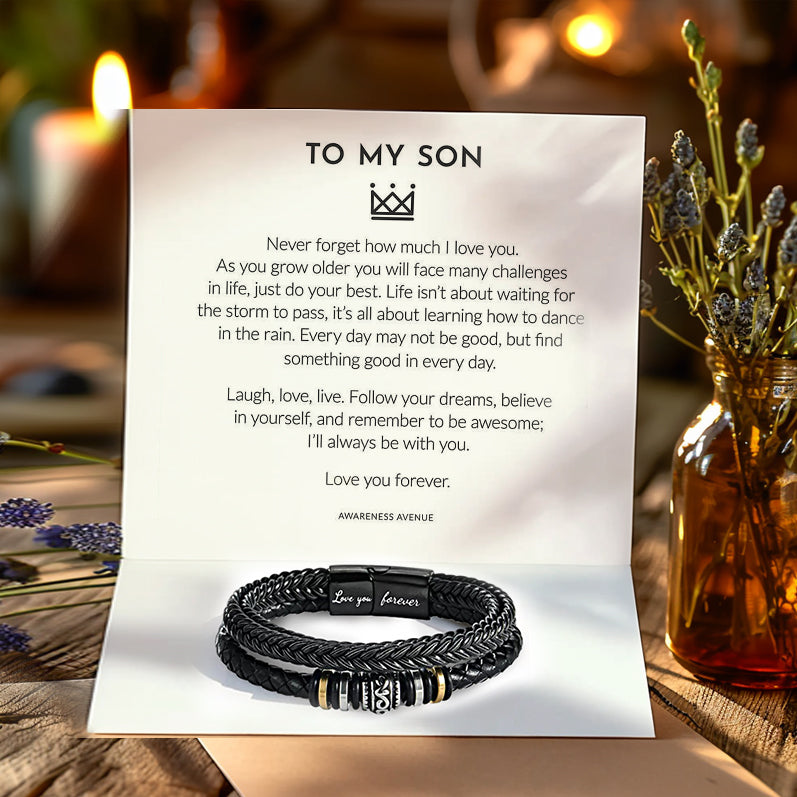 Close-up of bracelets from mom to son featuring durable stainless steel.