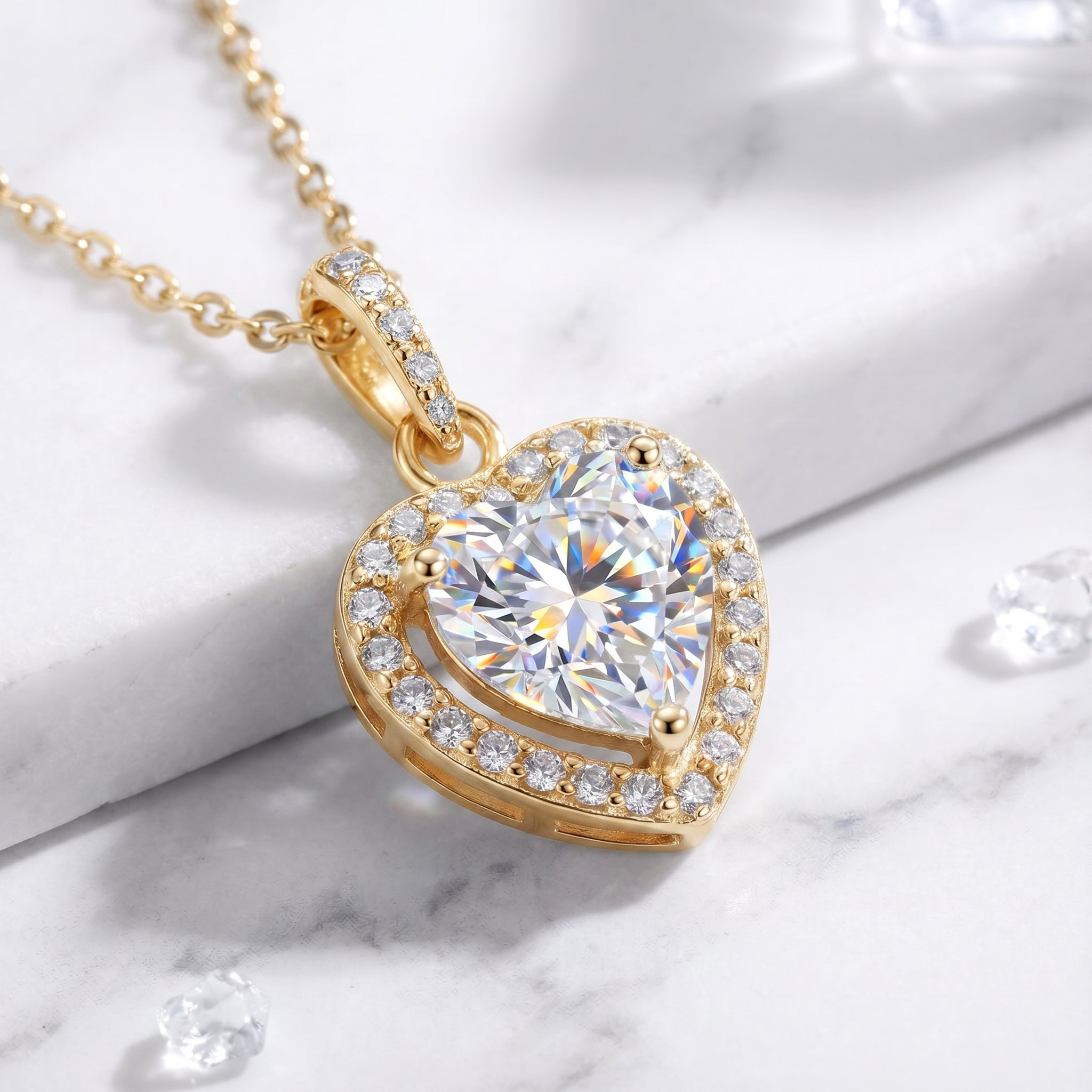 Heart-cut simulated diamond necklace in solid yellow gold.