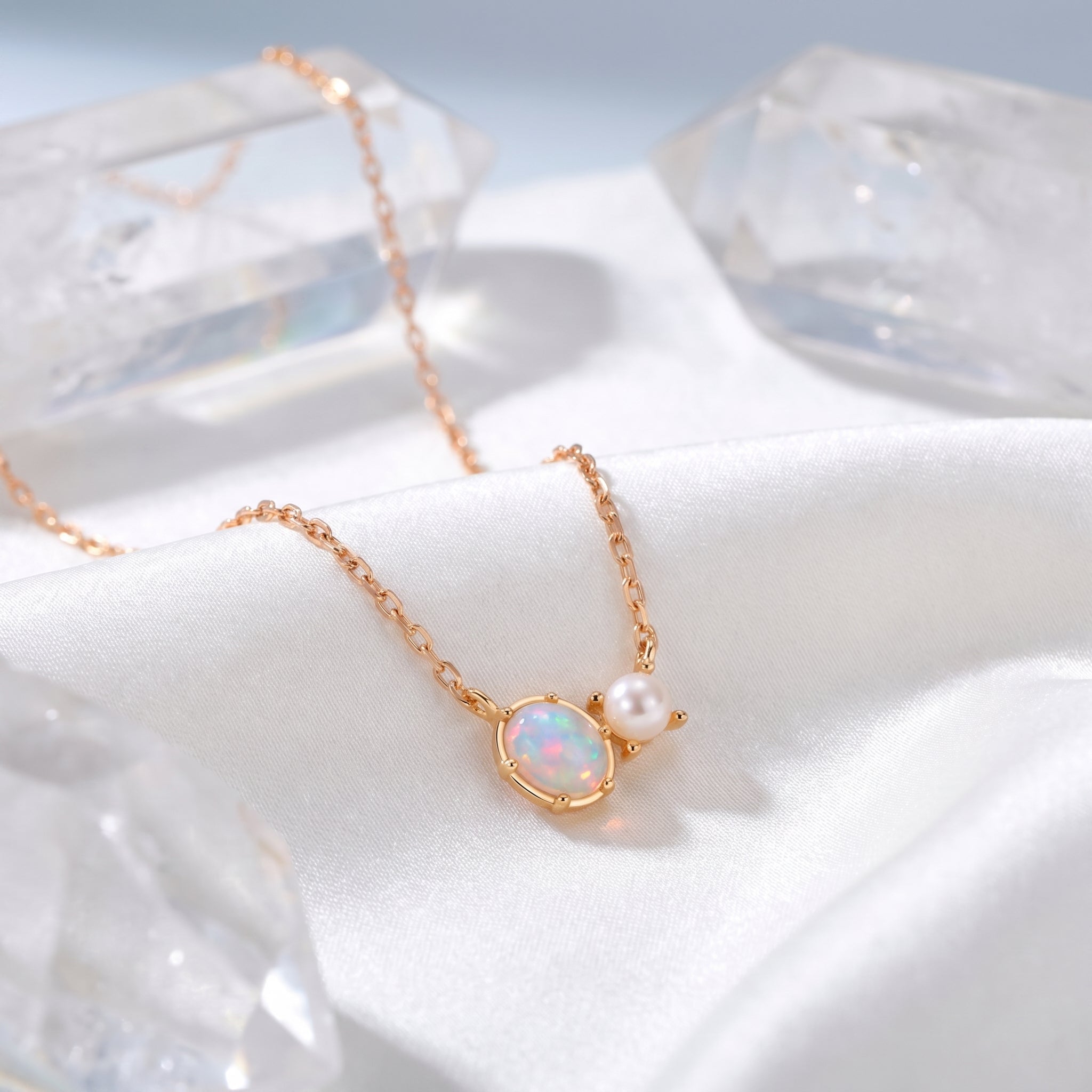 Lumira oval white opal necklace in 14K solid rose gold.
