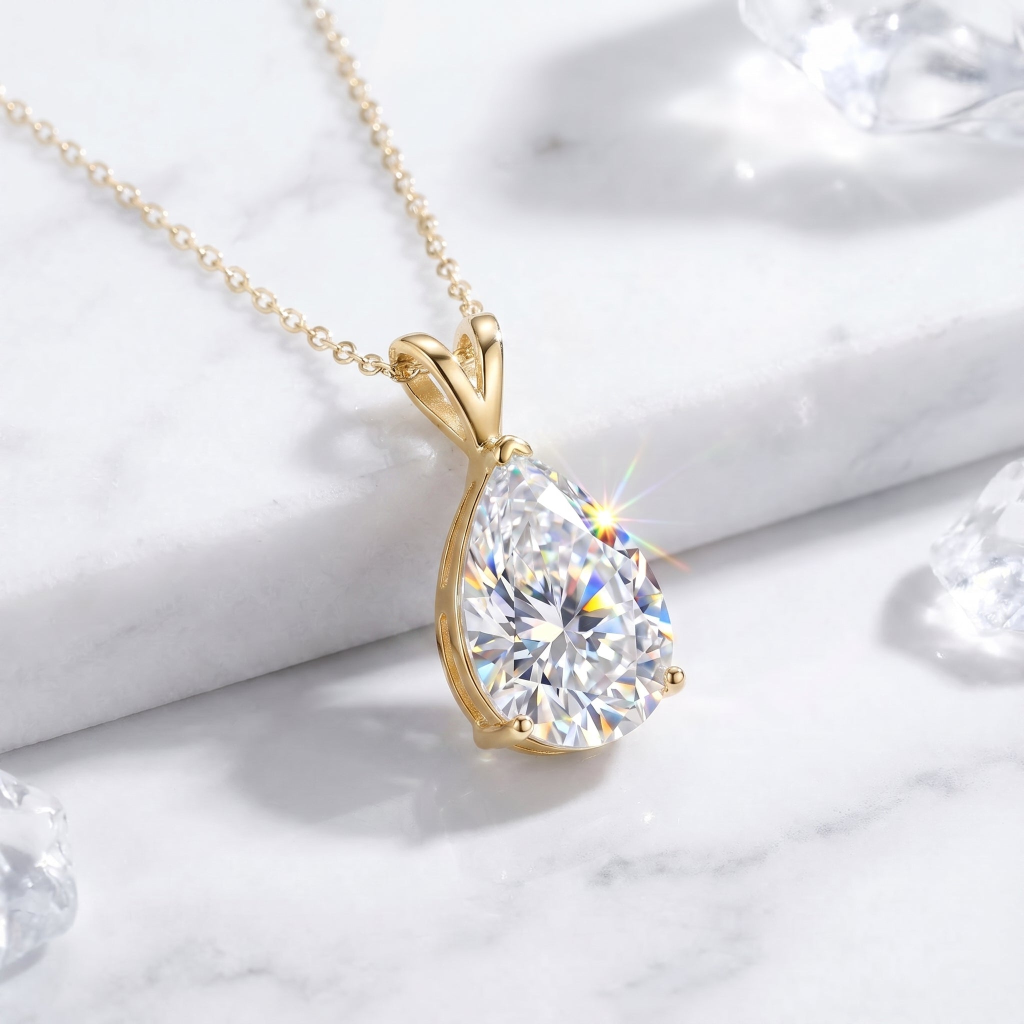 1.5CT pear-cut moissanite necklace in solid yellow gold.