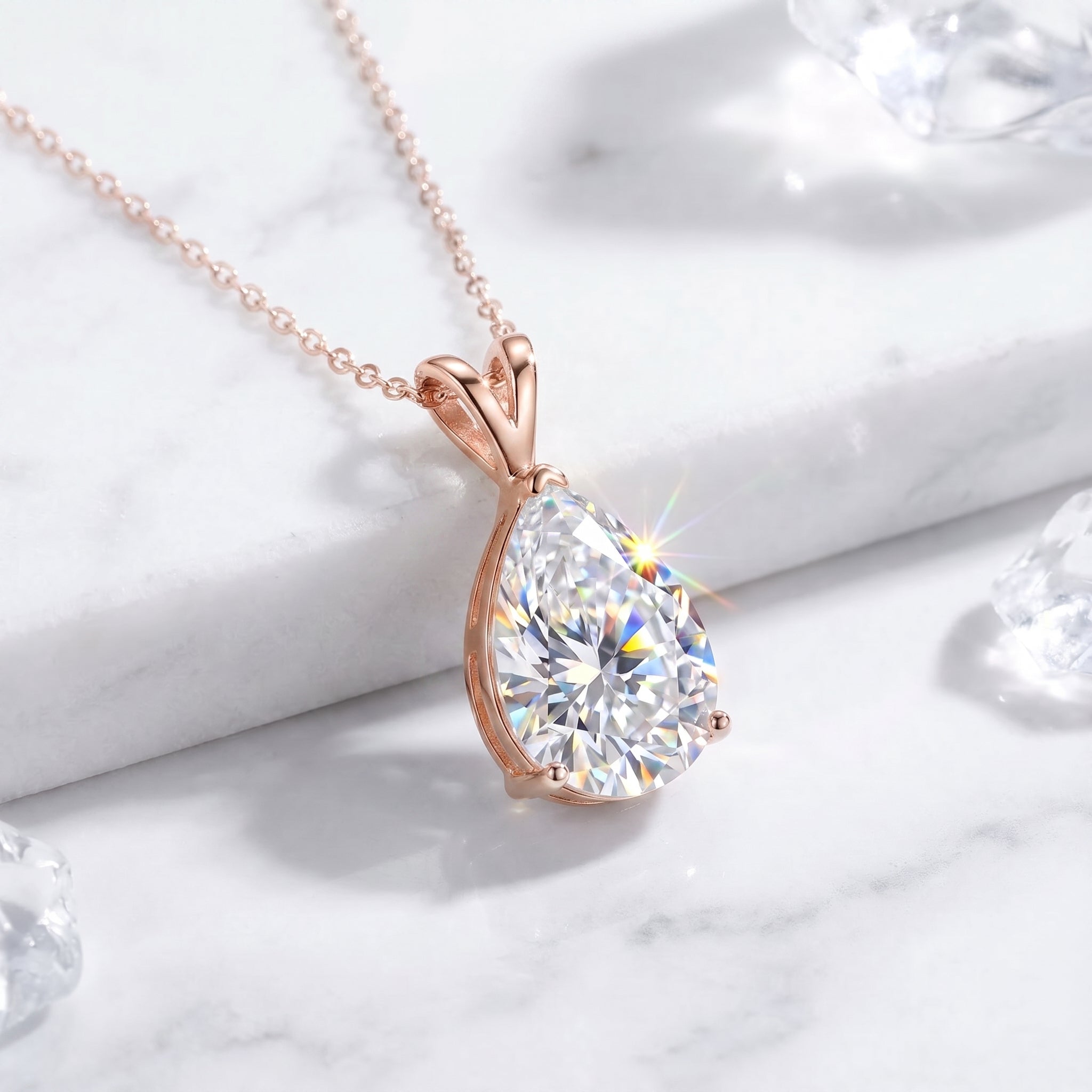 1.5CT pear-cut moissanite necklace in solid rose gold.
