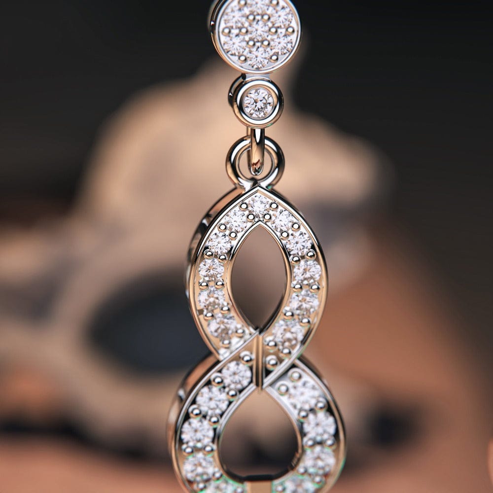 Azure Oceanic Earrings featuring turquoise stones in a sterling silver setting close up zoom