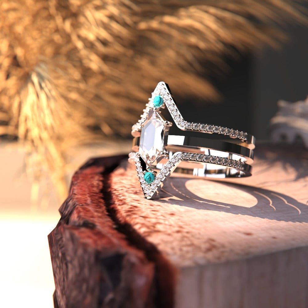 Elegant Calm Waters Turquoise Ring featuring a sterling silver band with big transparent cubic zirconia gemstone close up