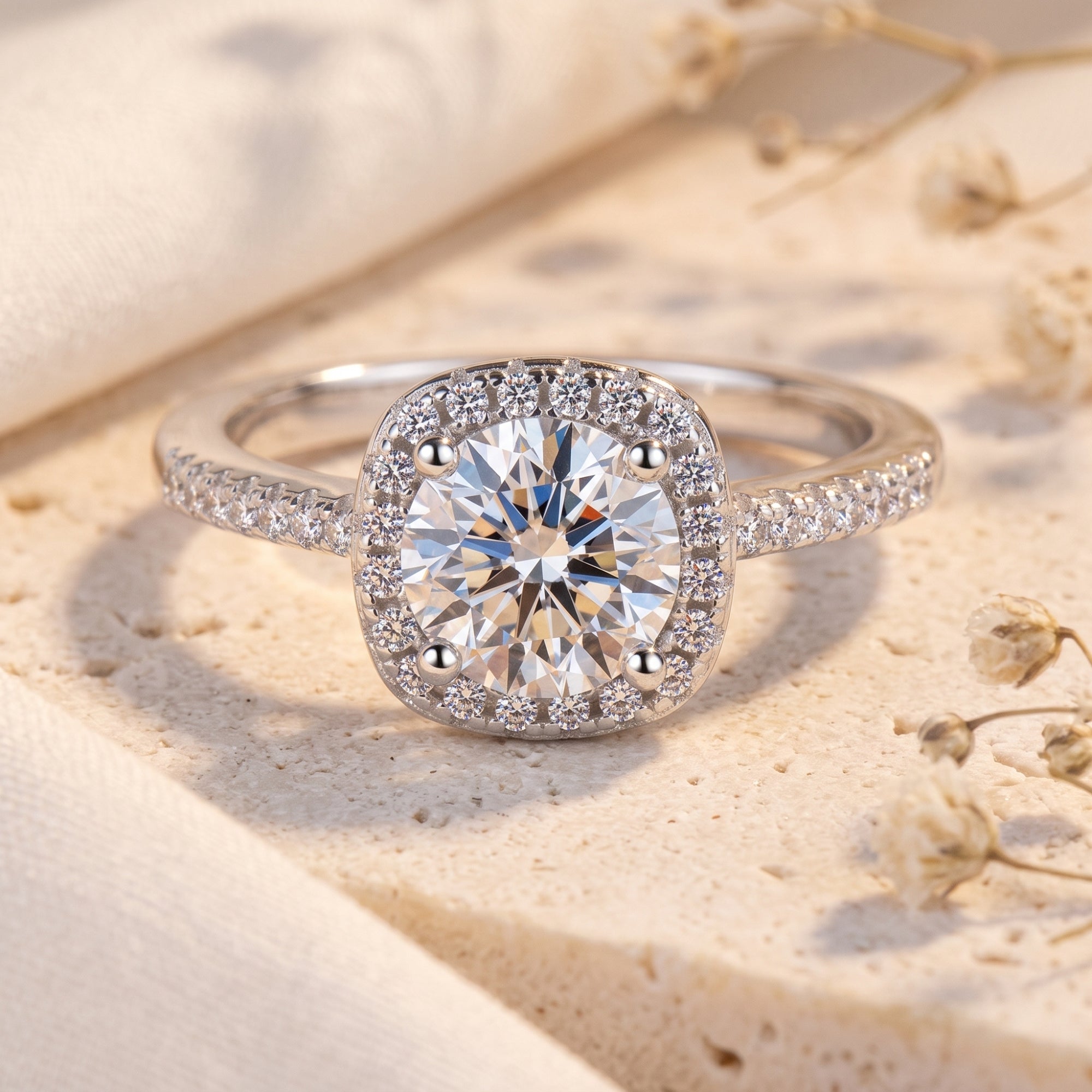 The Elianessa round cut simulated diamond halo ring in silver S925 sterling silver on a textured stone.