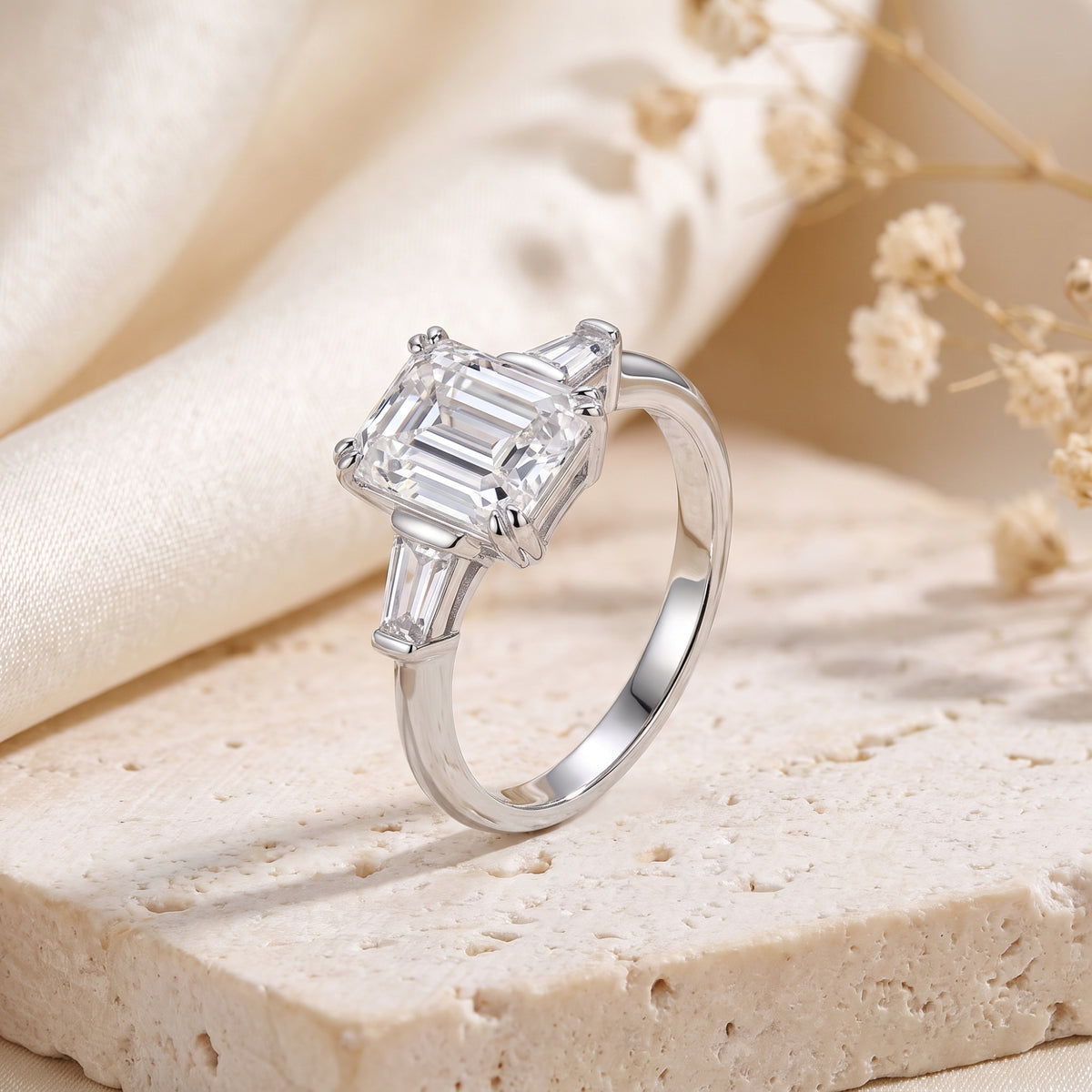S925 sterling silver emerald cut cubic zirconia ring on a stone lifestyle background.
