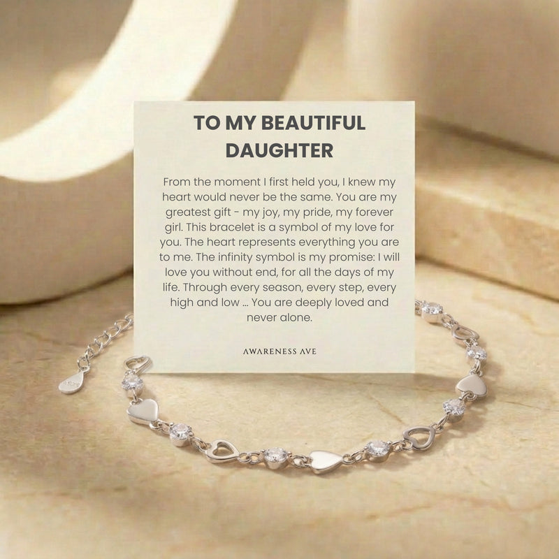 The 'Cherished Daughter' solid gold bracelet with a heart and infinity design