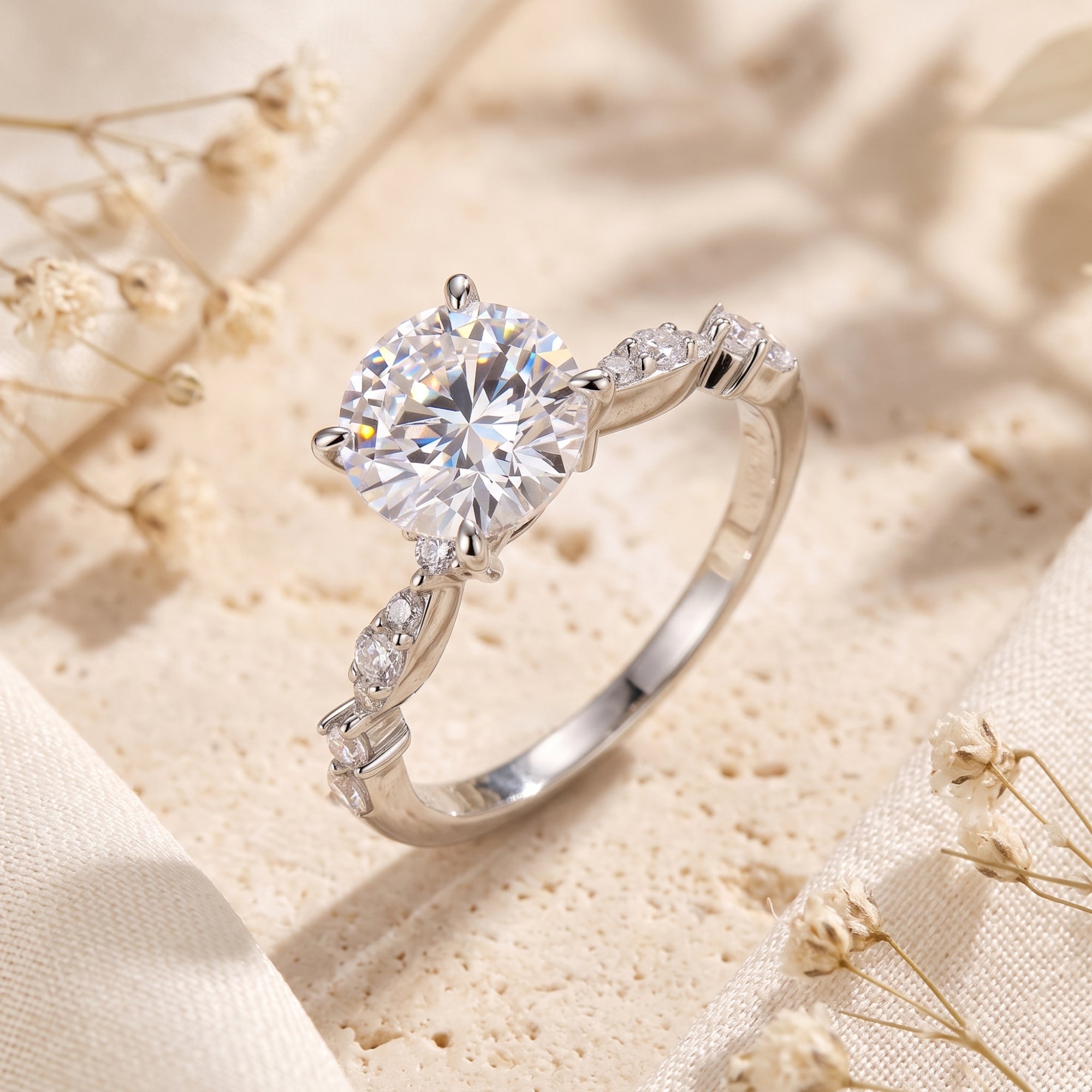 Round-cut simulated diamond solitaire ring in S925 sterling silver on a neutral lifestyle background.