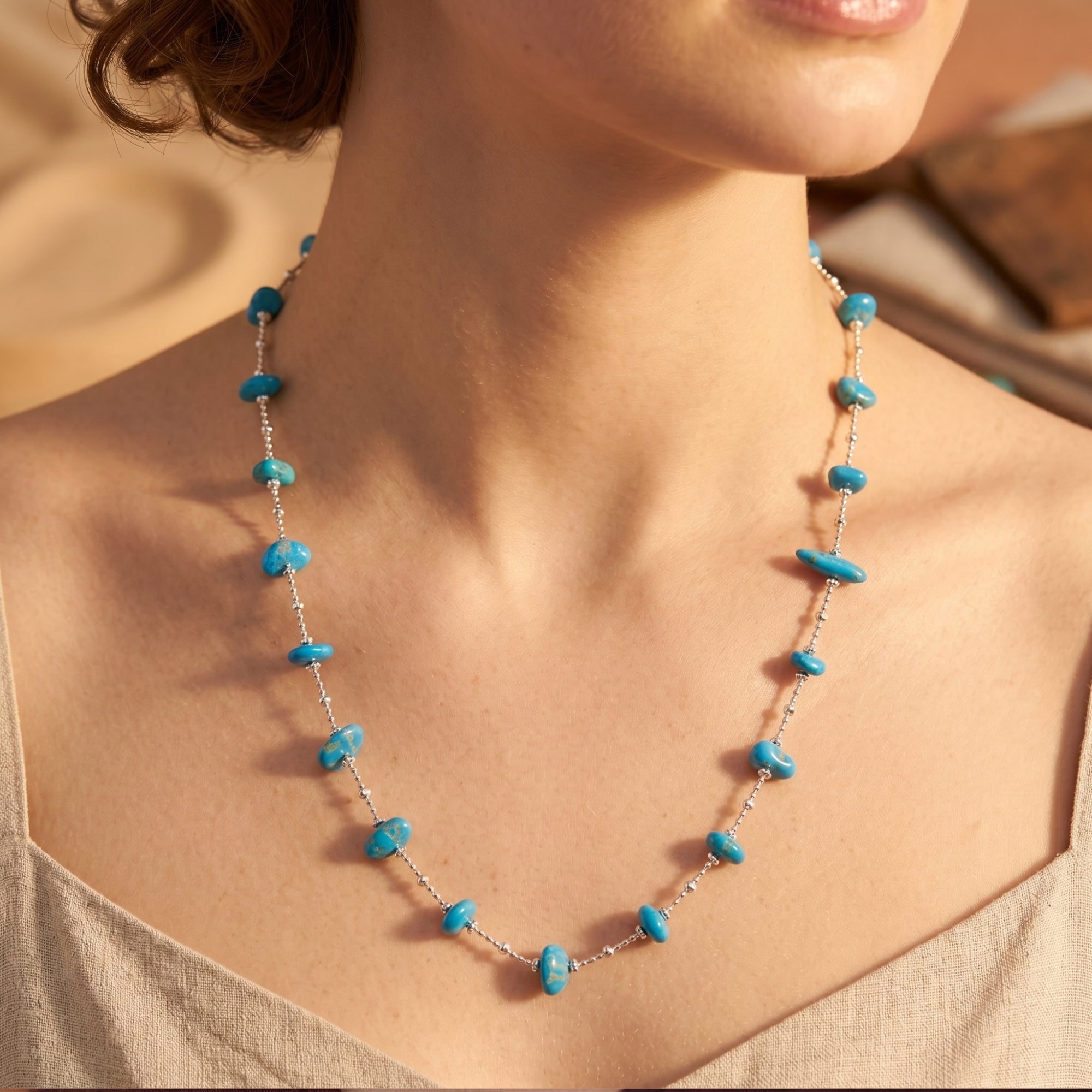 Gallup turquoise bead choker in silver worn by a model.