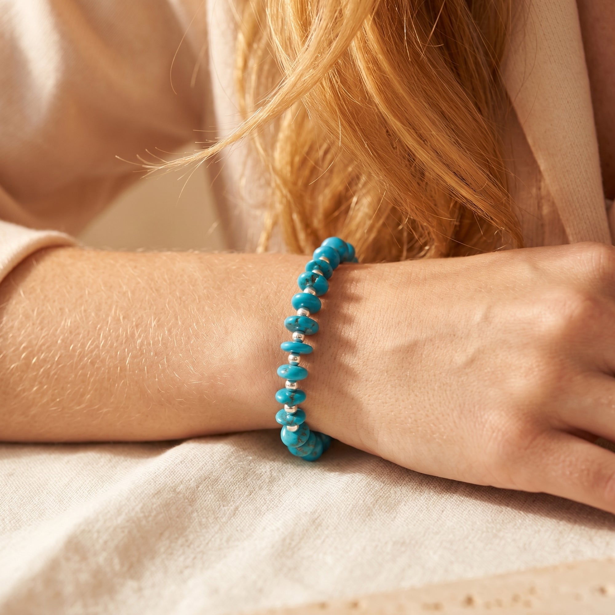 Marfa turquoise bead bracelet in S925 sterling silver worn on a woman's wrist.