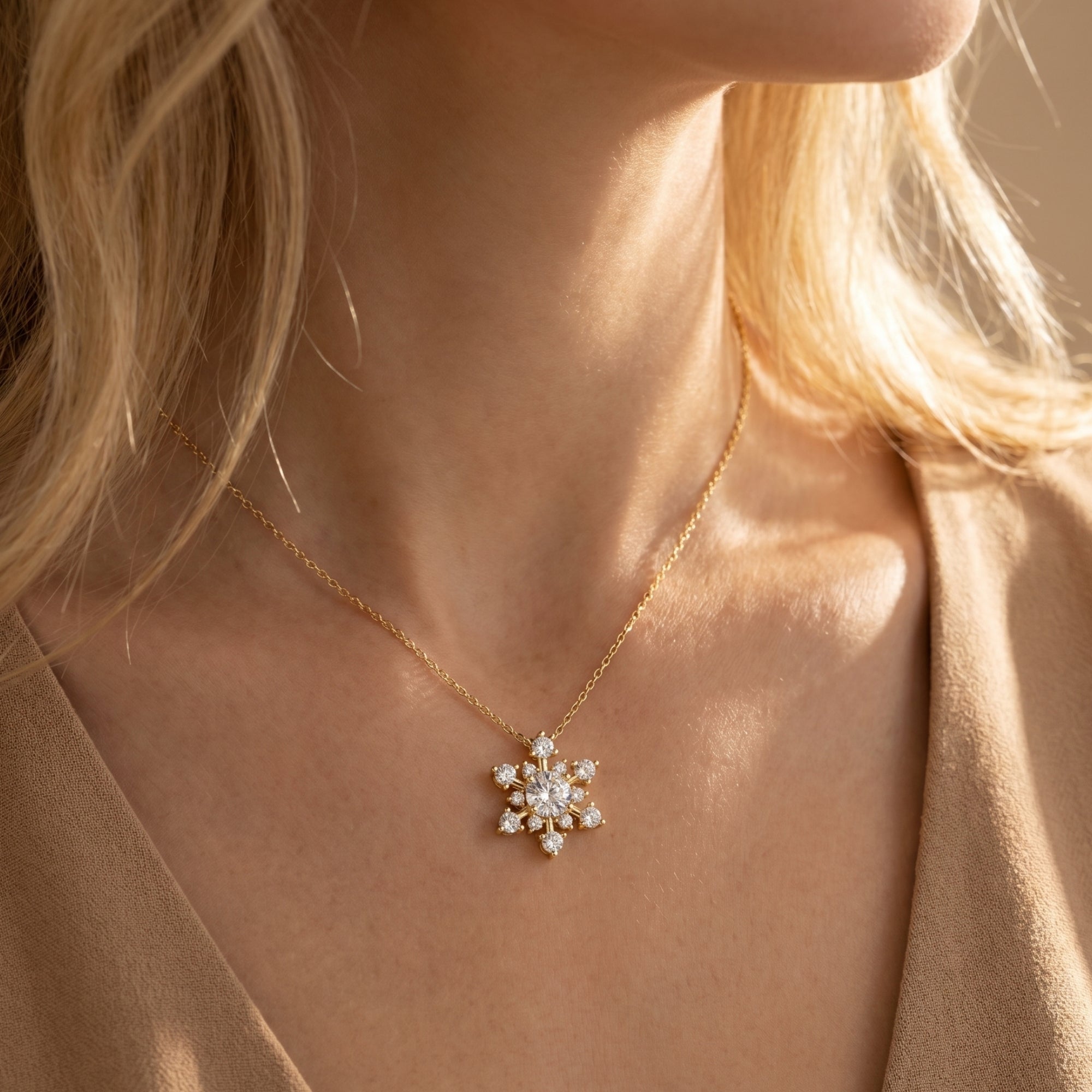 Model wearing the yellow gold moissanite snowflake necklace to show scale and fit.
