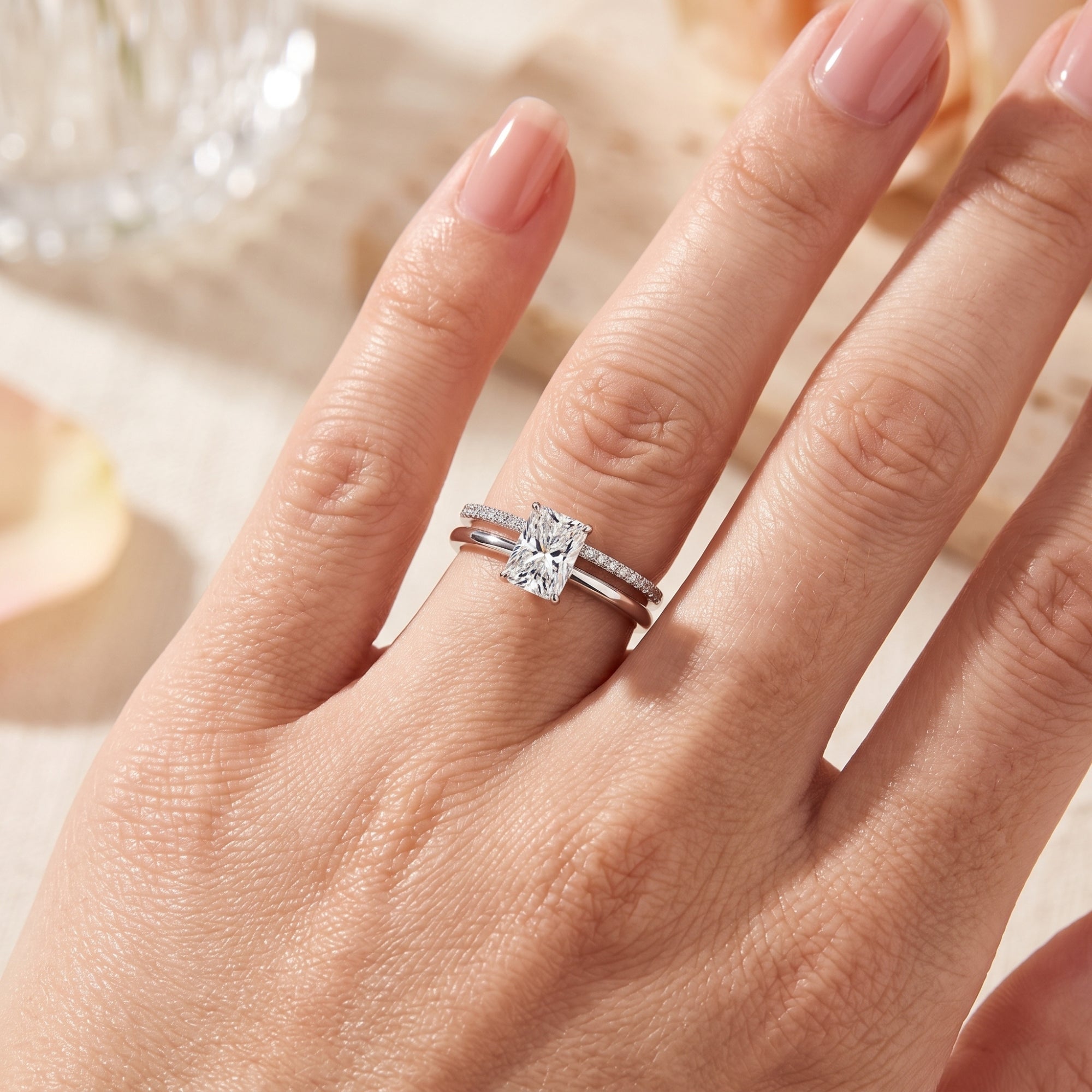 S925 sterling silver emerald-cut ring set worn on a model's finger.