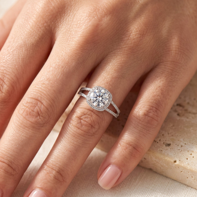 Close-up view of the silver halo split-band ring worn on a finger.