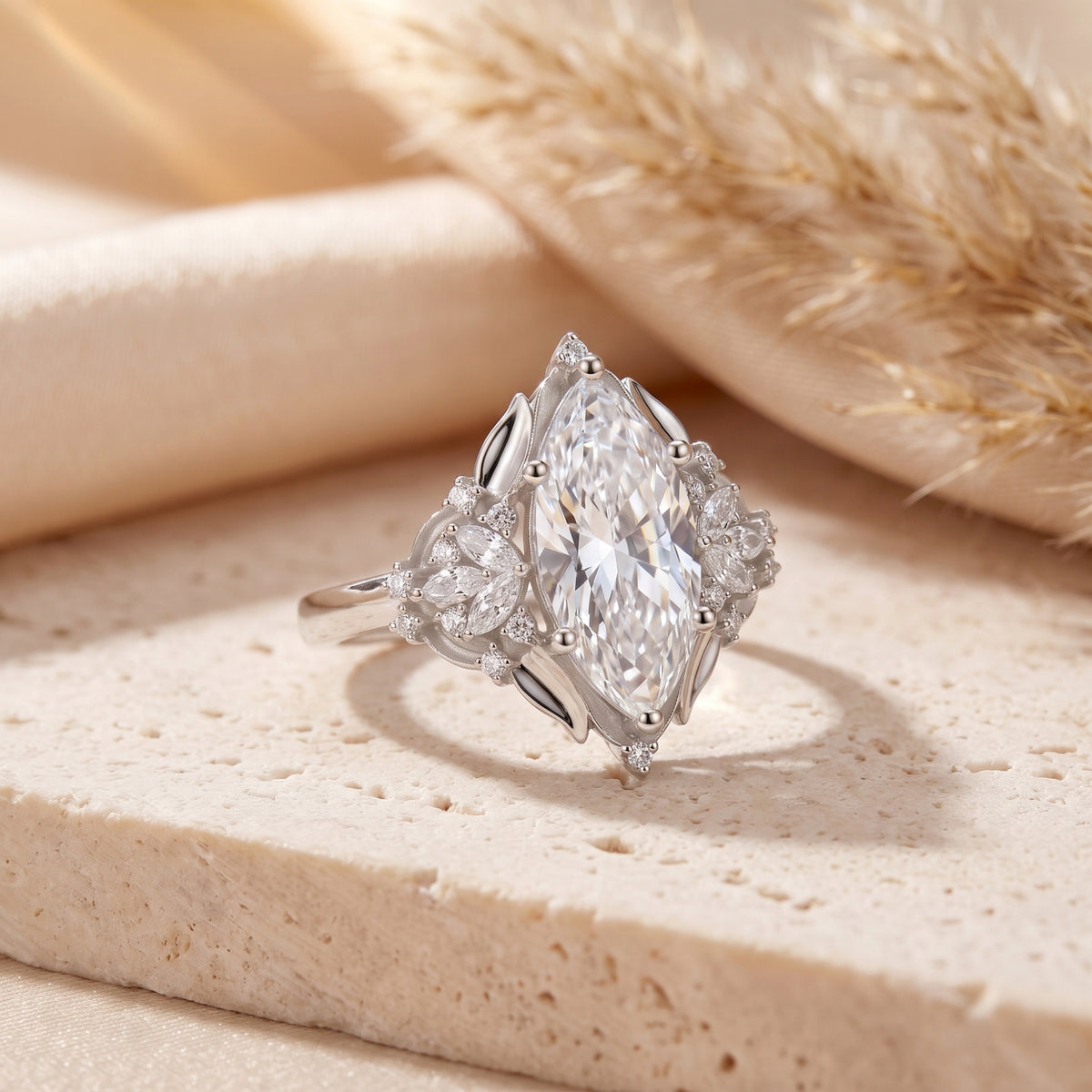 Angled view of sterling silver marquise simulated diamond ring on stone.