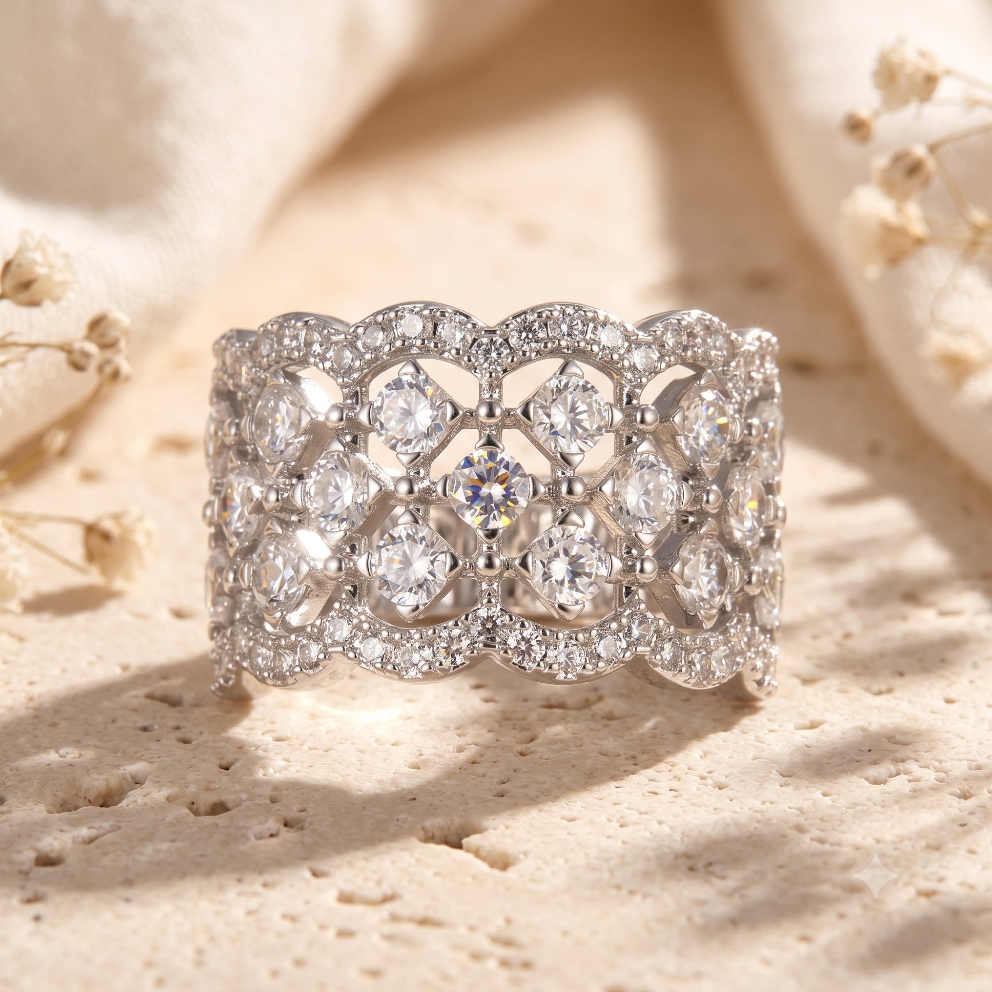 Macro of Carisienne silver ring showing lattice detail and simulated diamonds.