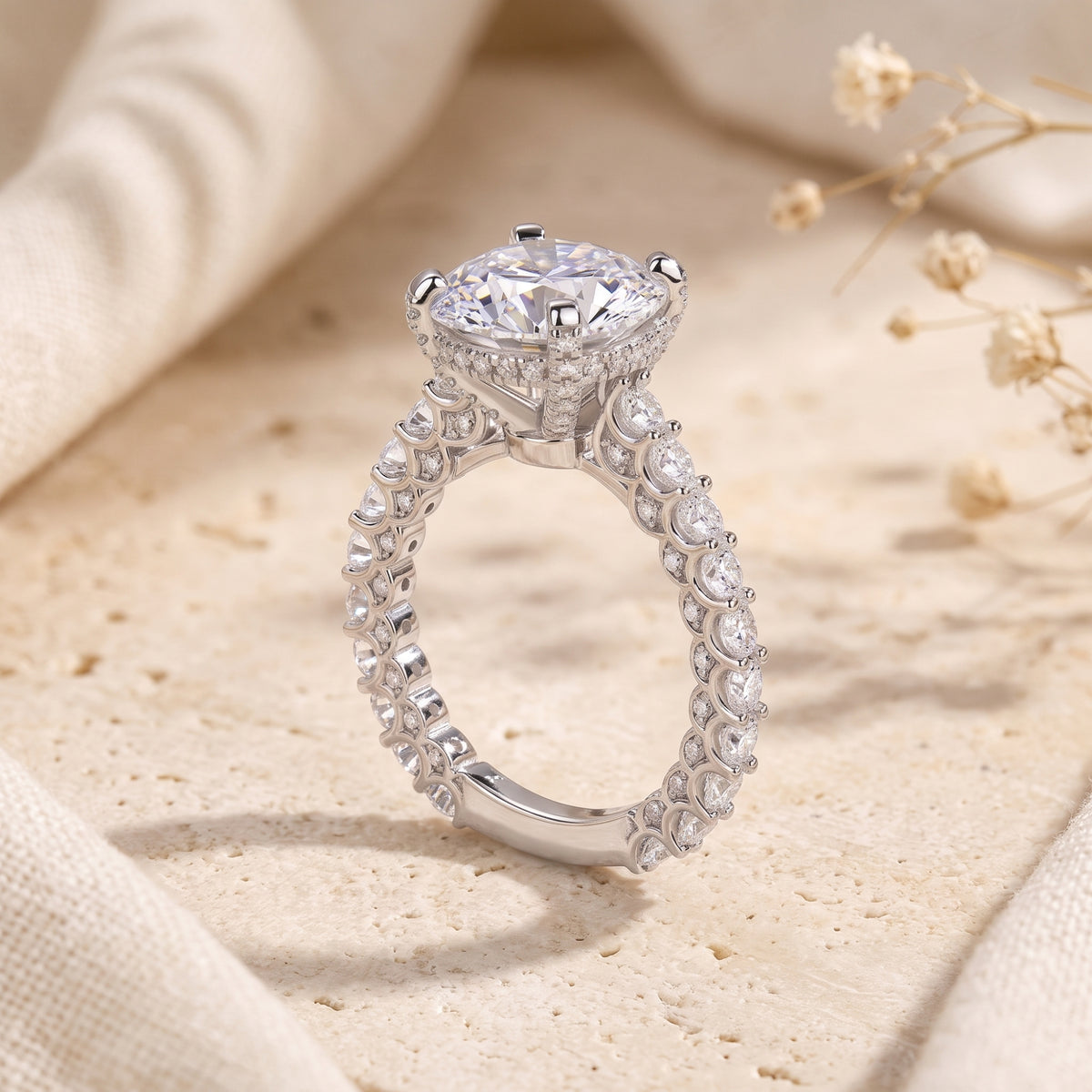 Side profile view of the silver ring showcasing the hidden halo setting and detailed band.