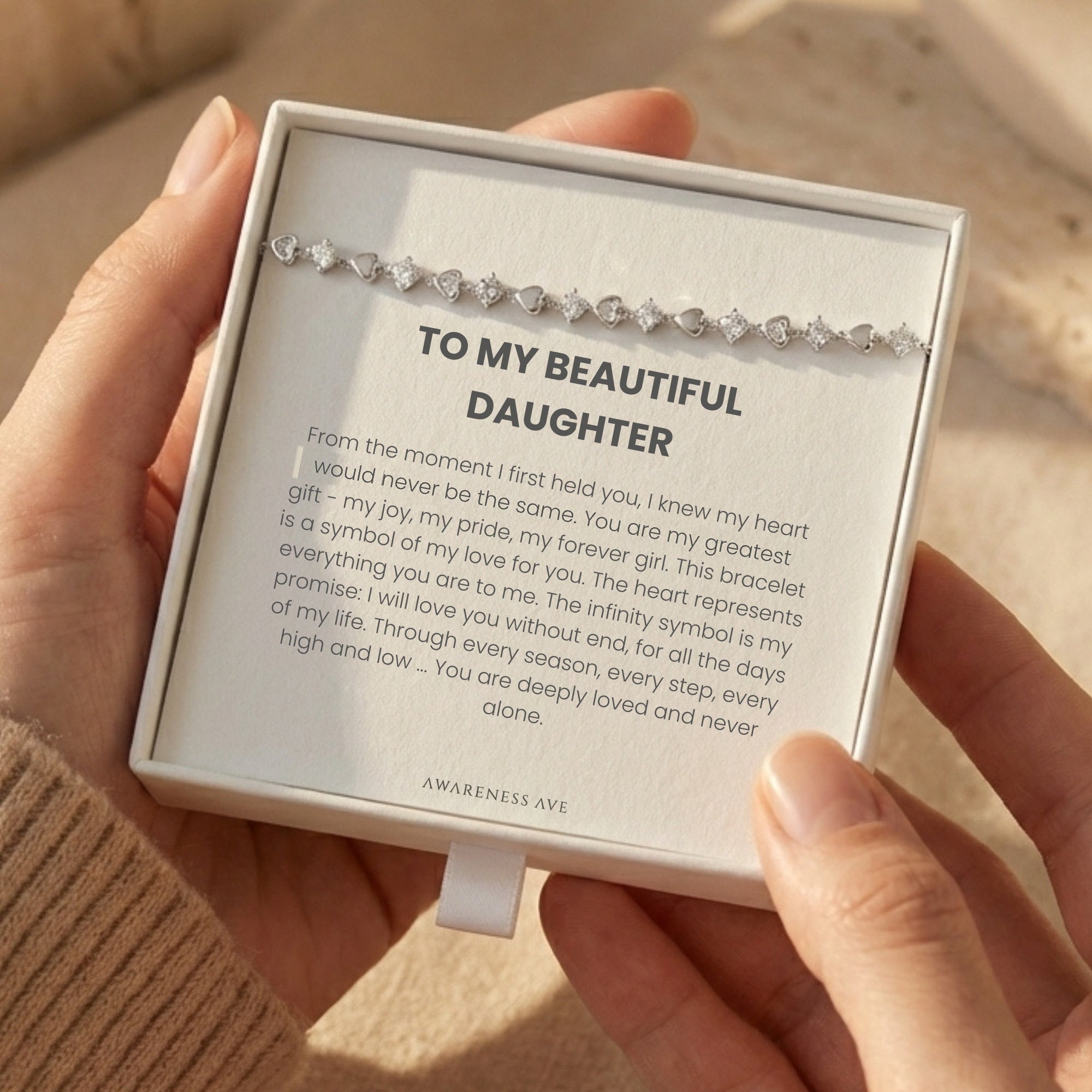 The 'Cherished Daughter' solid gold bracelet with simulated diamonds