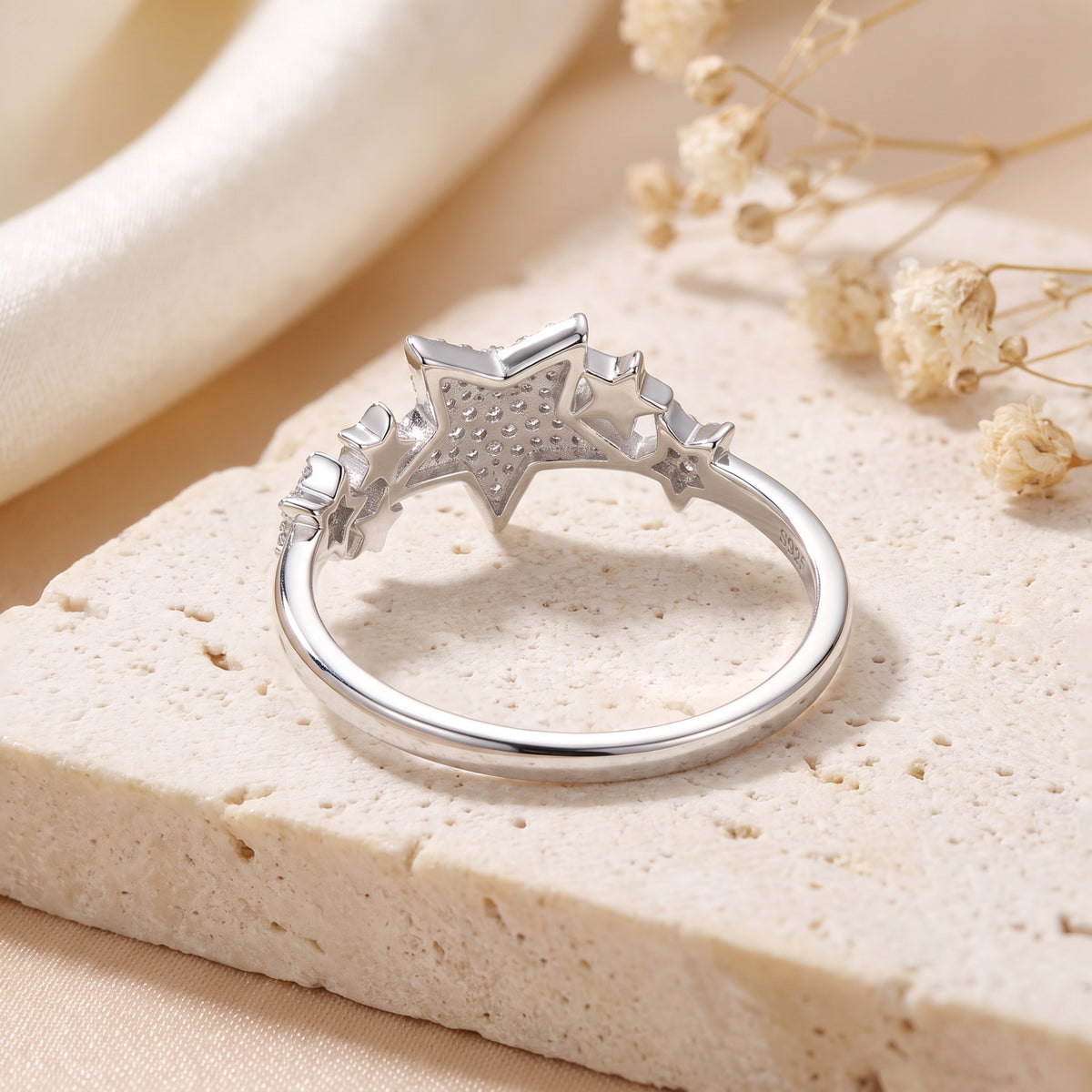Rear view of the S925 sterling silver Celestia star ring showing the hallmark and polished band.