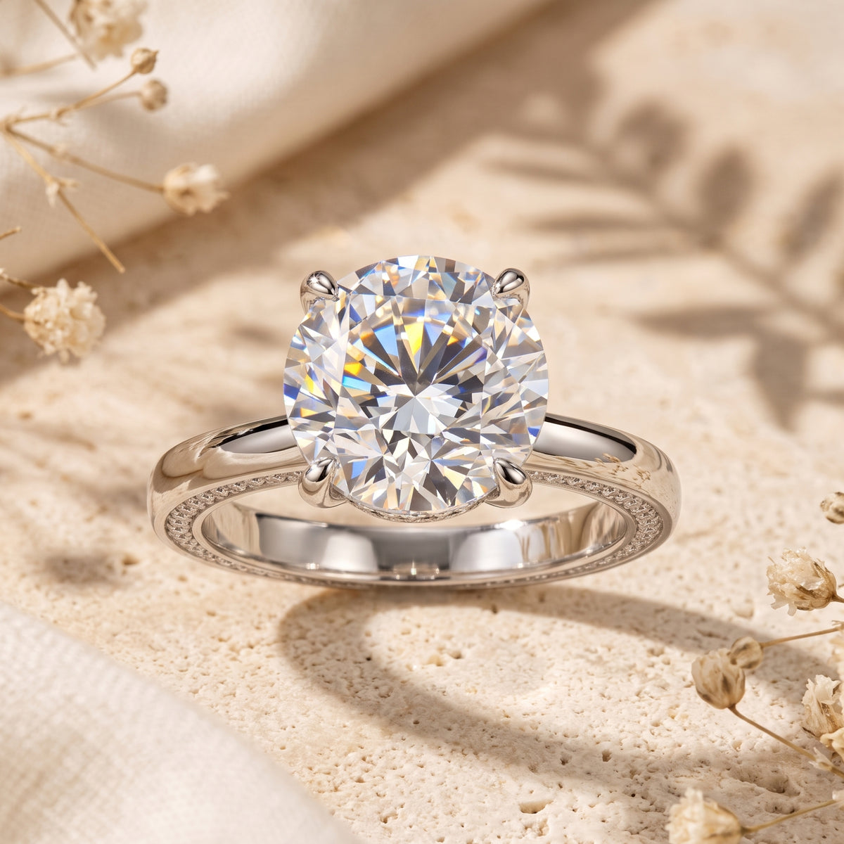 Macro view of the 11mm round-cut simulated diamond and pavé-set sterling silver band of the Iselienne ring.