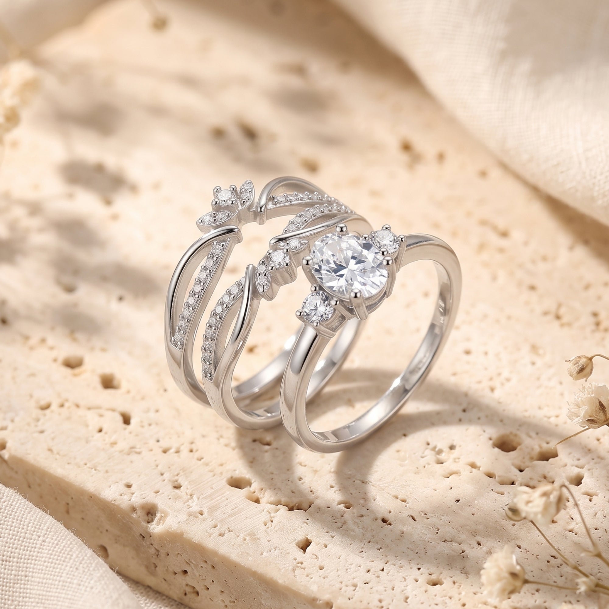 Side view of the sterling silver Philomene ring set showing the oval center stone and pavé bands.
