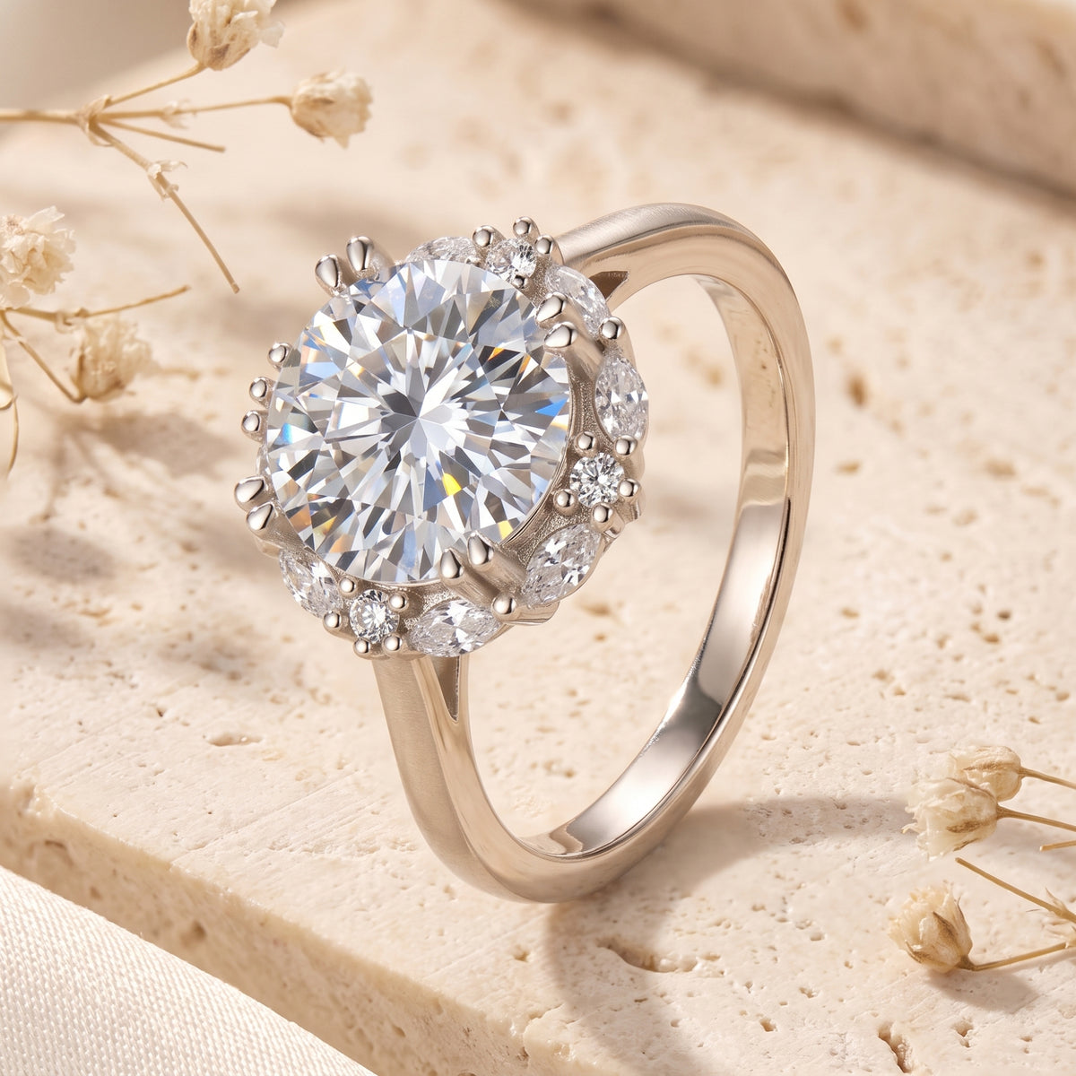 Angled side view of the silver halo ring, showing the smooth band and raised stone setting.