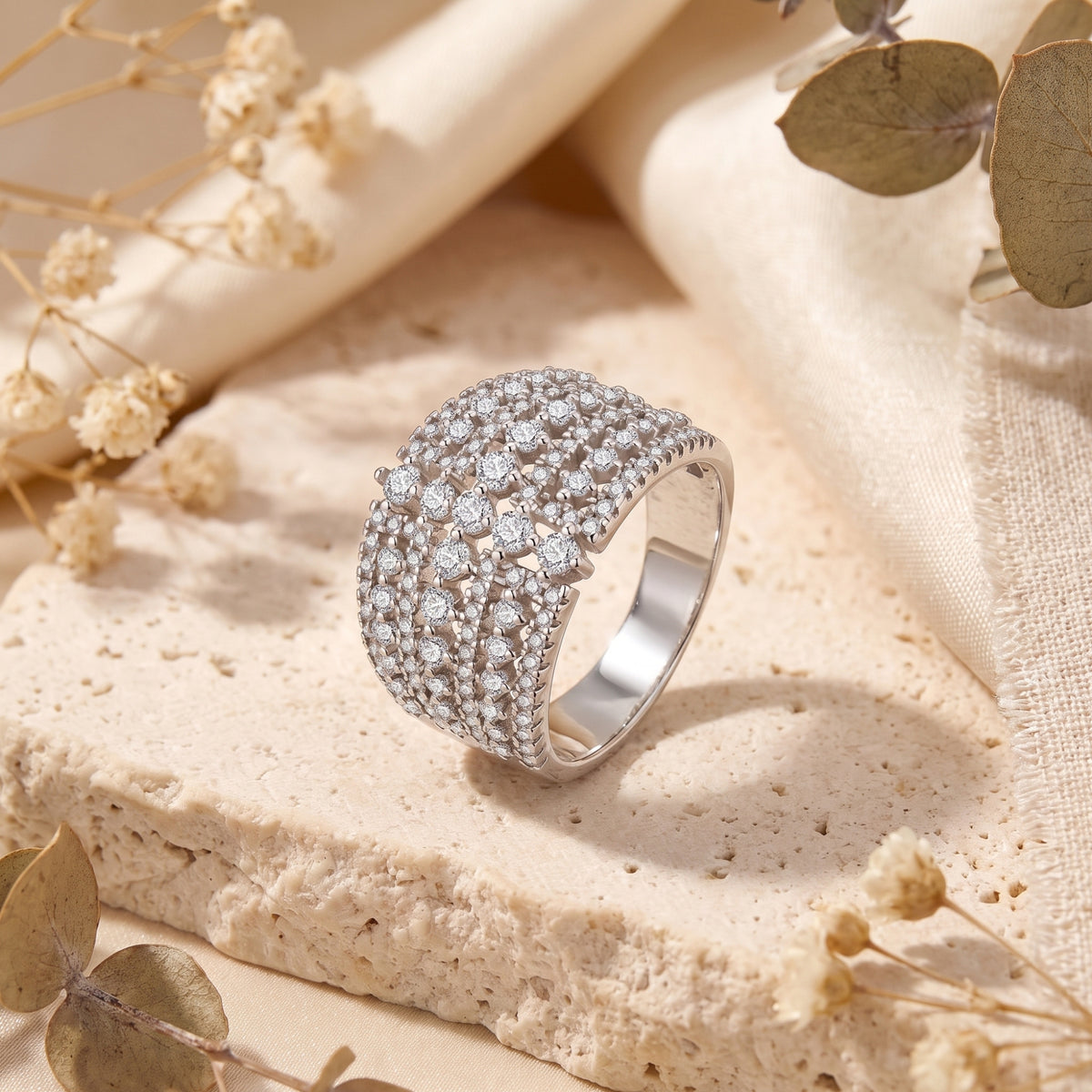 Side view of the Eleonora silver statement ring featuring a geometric grid of round simulated diamonds.