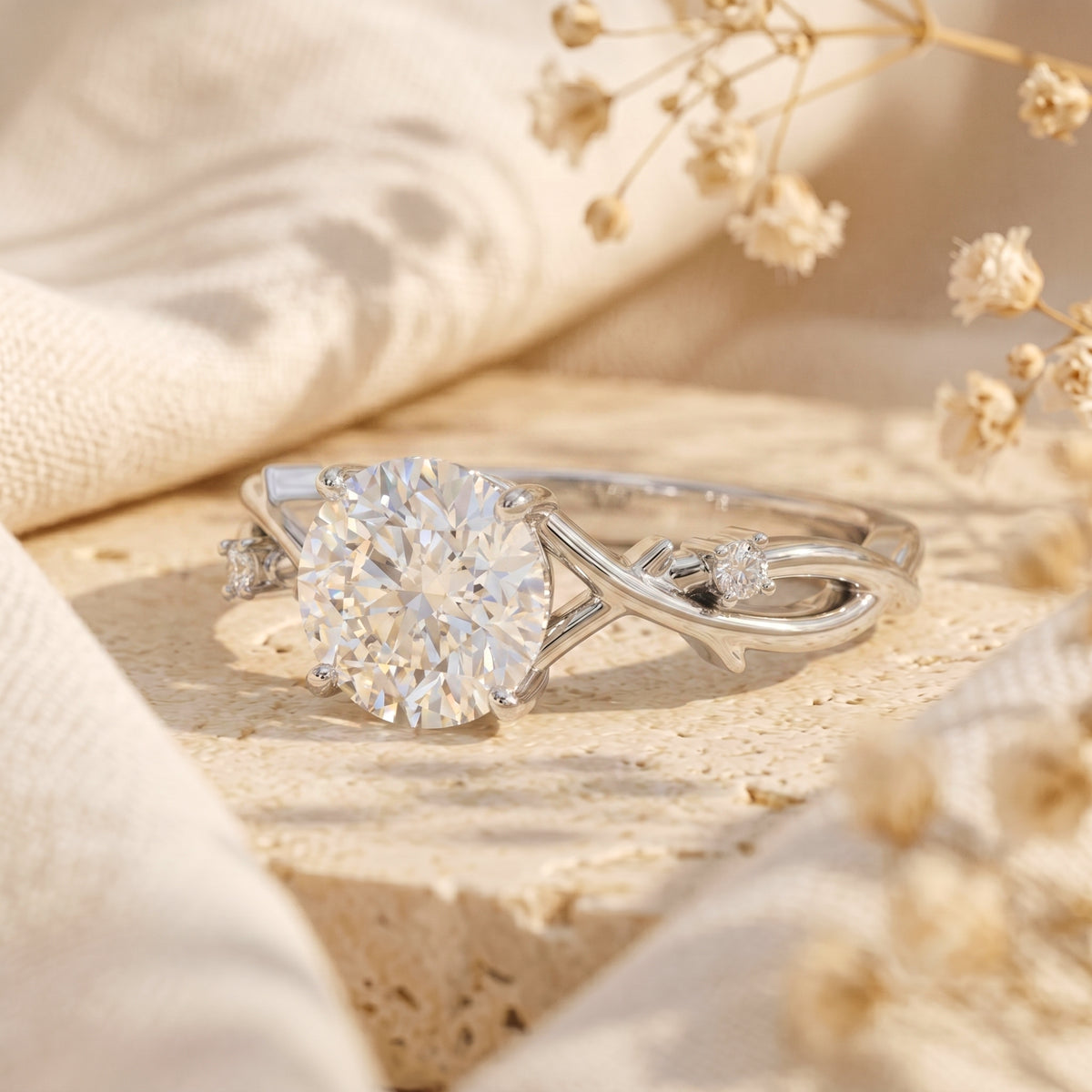 Side view of the Sylvella moissanite engagement ring in silver showing the intricate vine-like band.