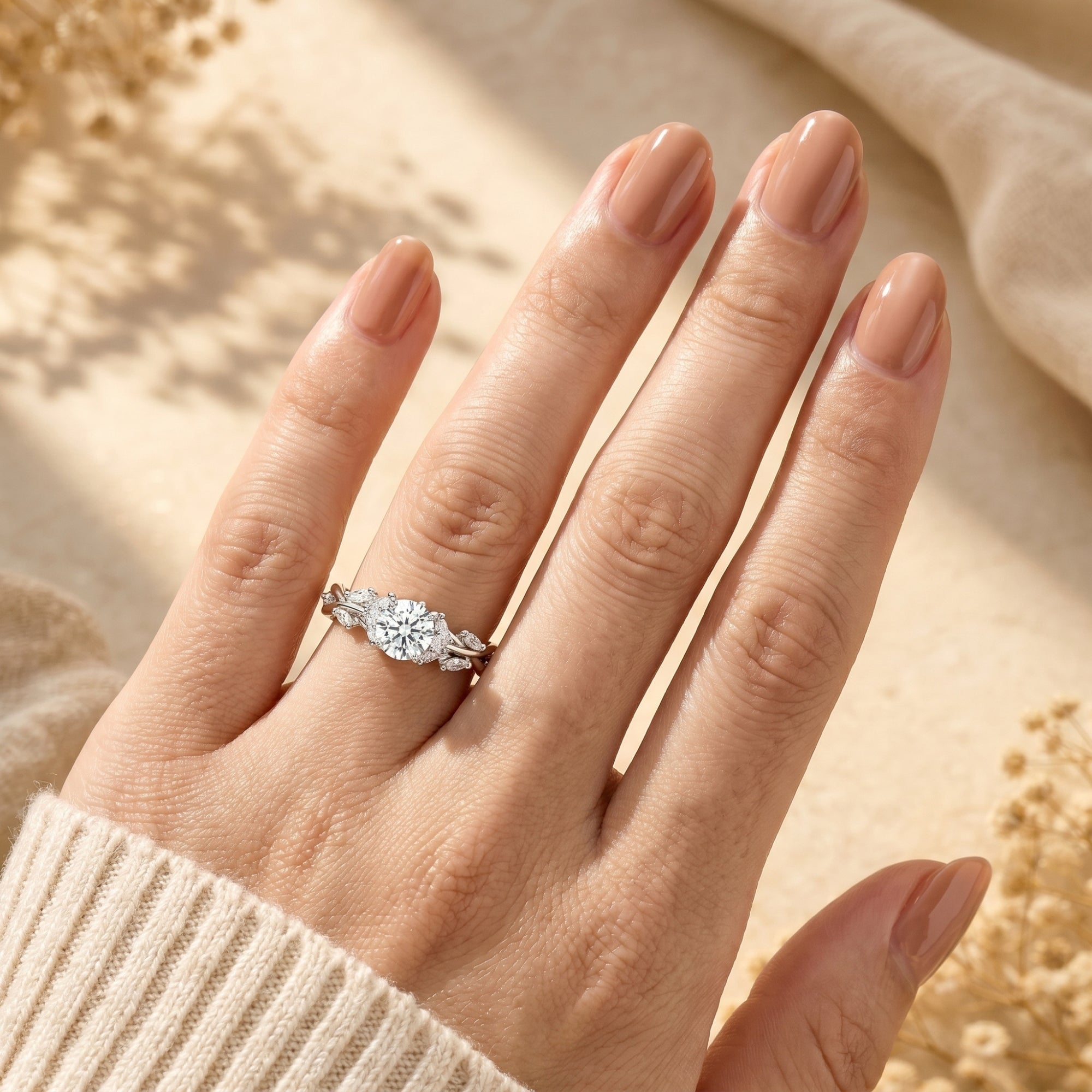 Top view of the 2-carat round moissanite promise ring in silver on a finger, showcasing the brilliant stone.