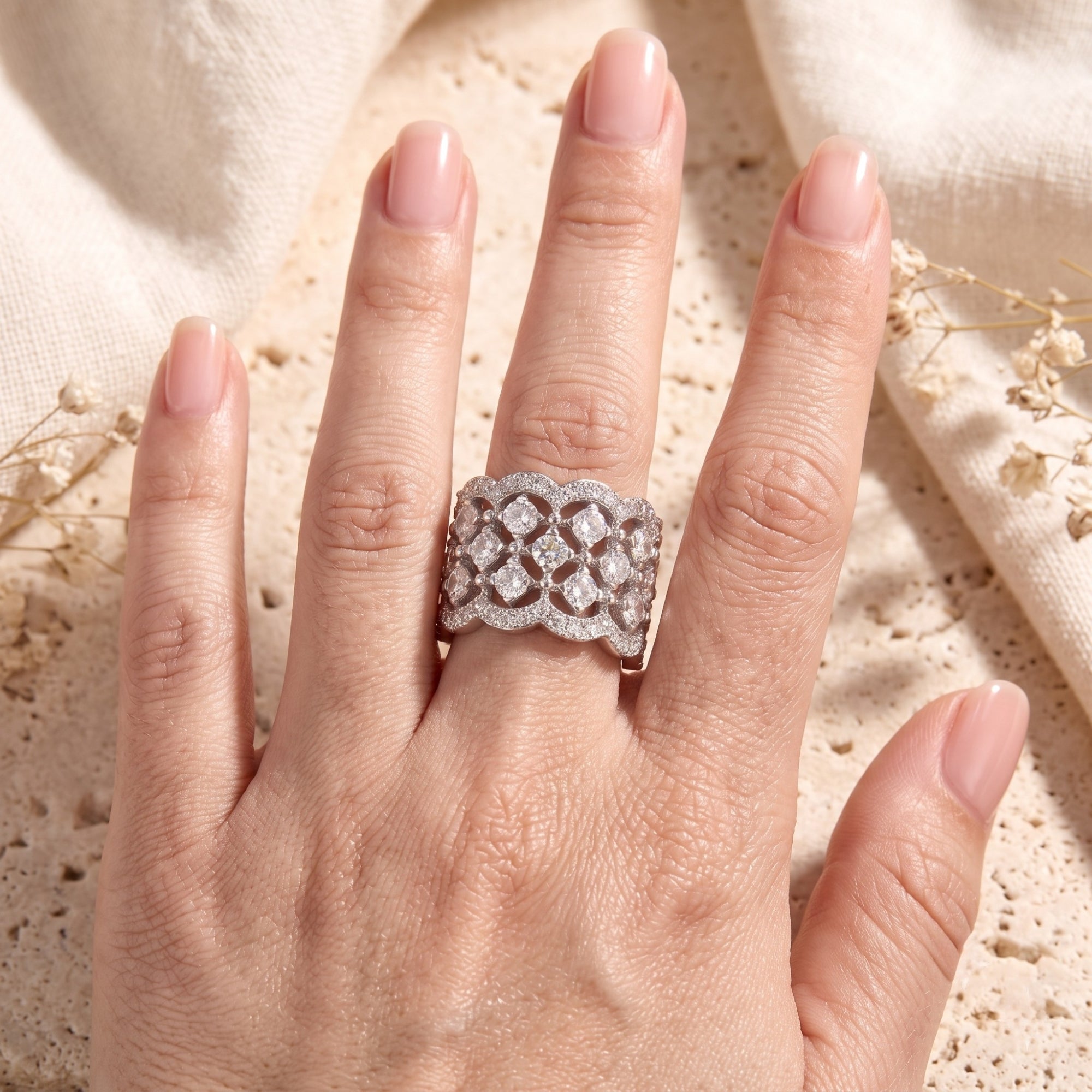 Carisienne silver lattice ring on hand showing scale and fit.