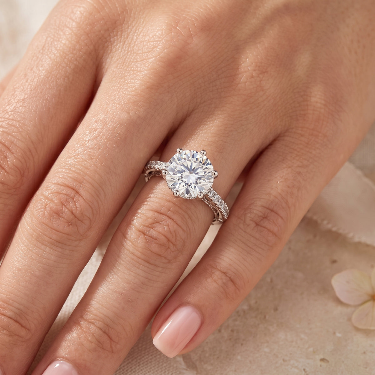 Top view of the 9mm round CZ solitaire sterling silver promise ring on a model's finger.