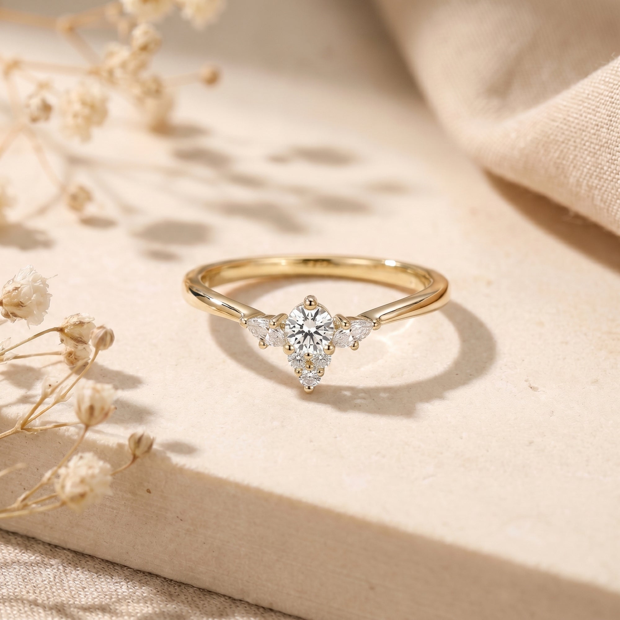 Yellow gold Lysianna ring with a 6.5mm simulated diamond center stone and vintage floral cluster accents.