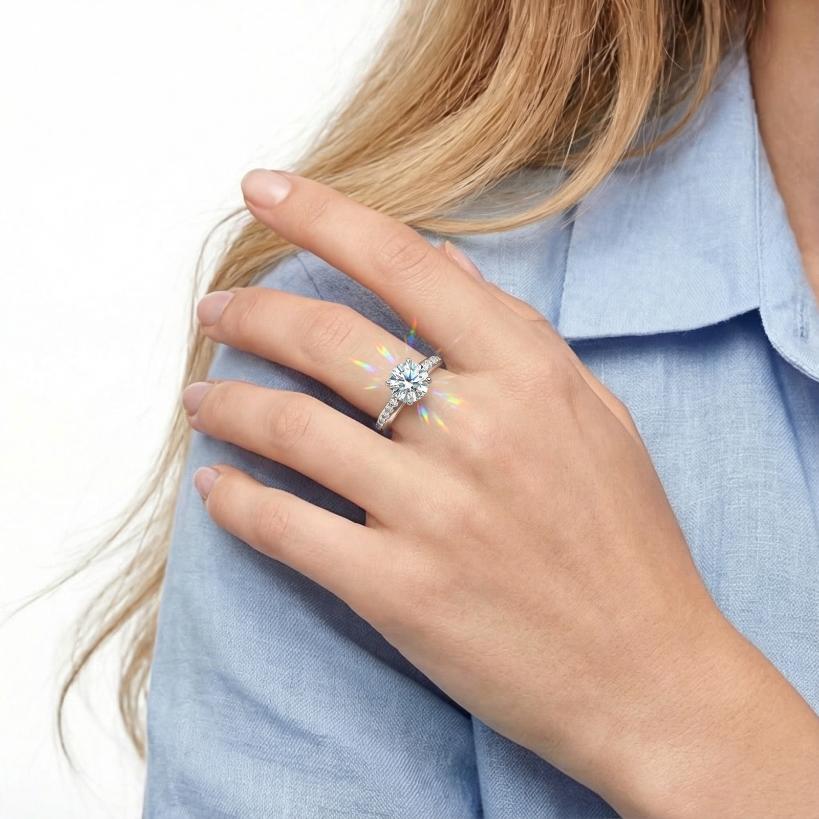 Woman wearing the Iseltra S925 sterling silver bypass ring with a sparkling round-cut simulated diamond.