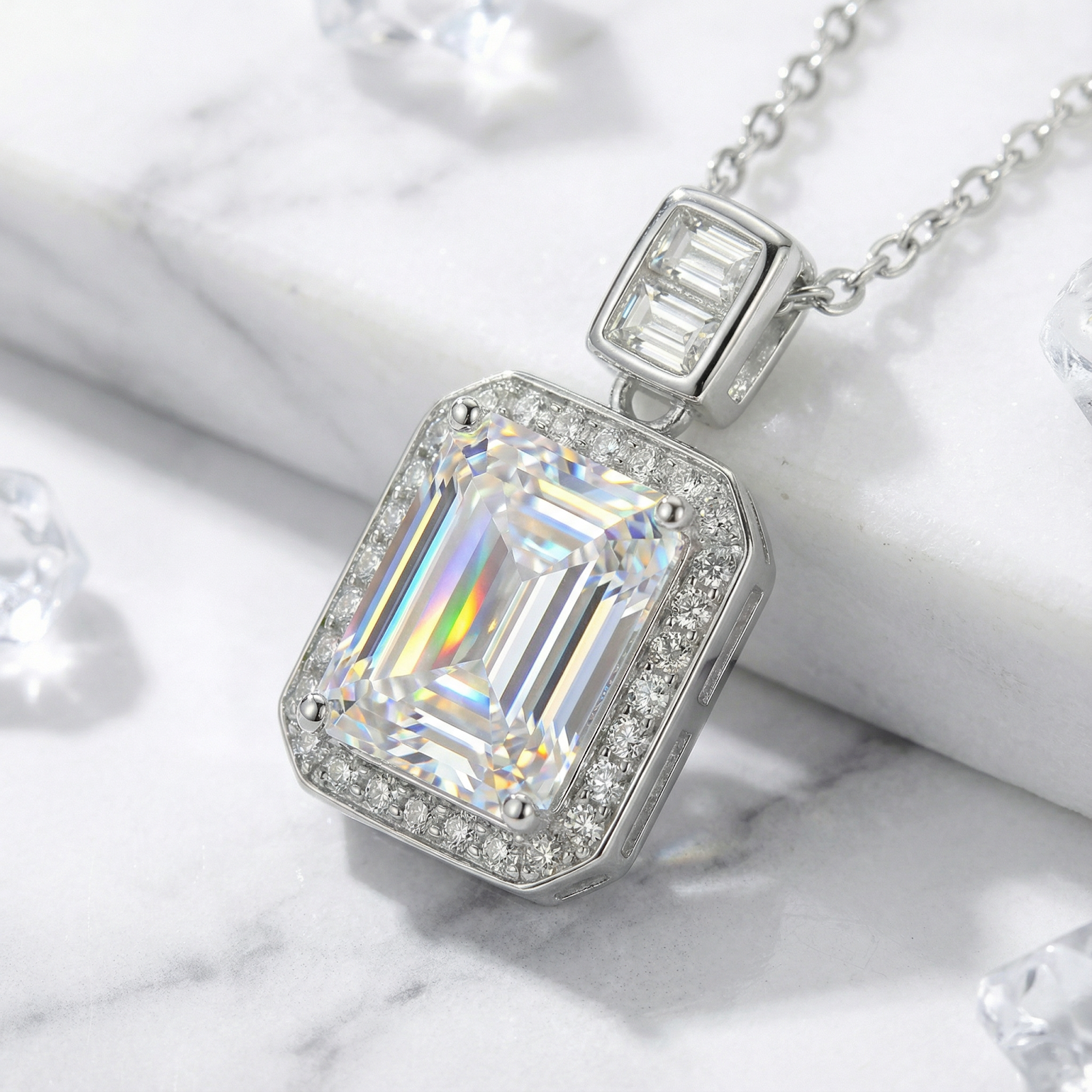 Close-up of the emerald cut zirconia and halo setting on the S925 sterling silver Aurella necklace.