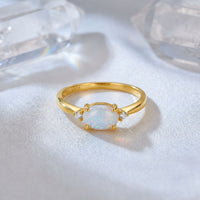 The Majesty Oval Opal Ring in solid gold, featuring a natural oval opal gemstone.