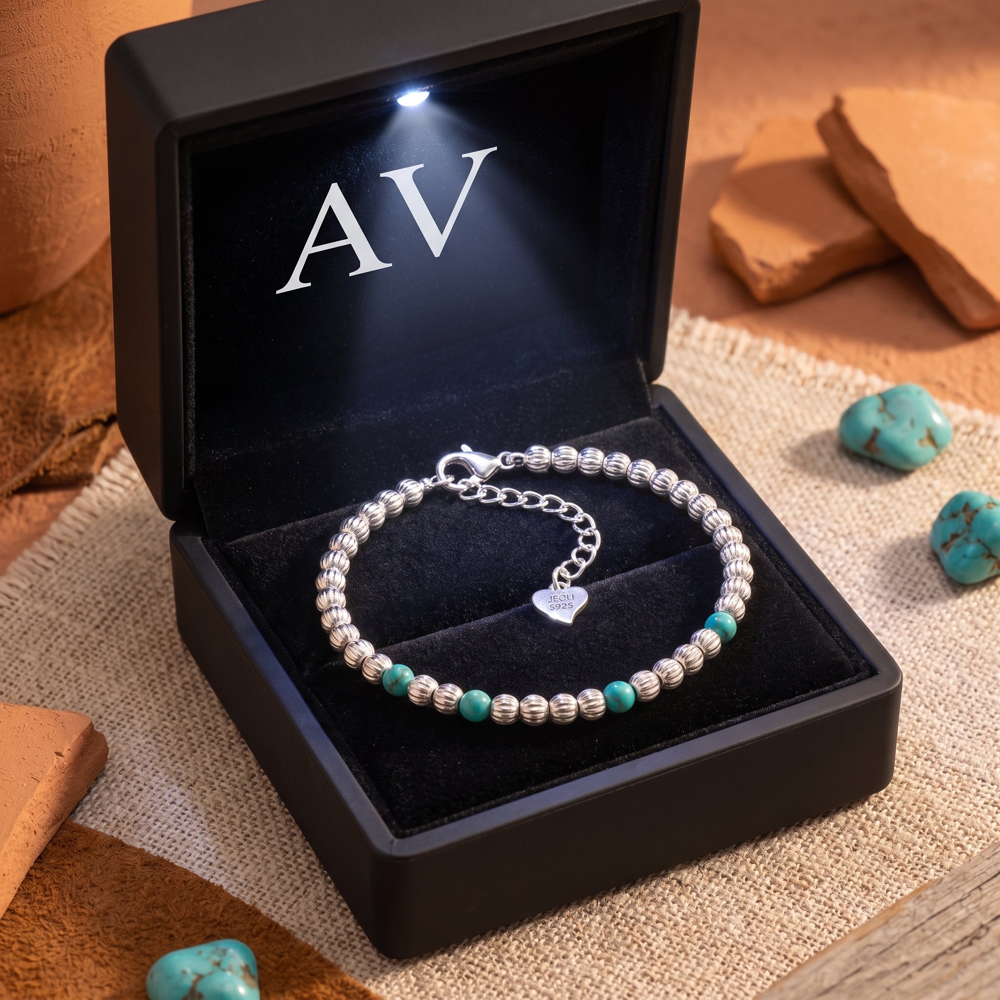 Silver turquoise bead bracelet in a lighted gift box.