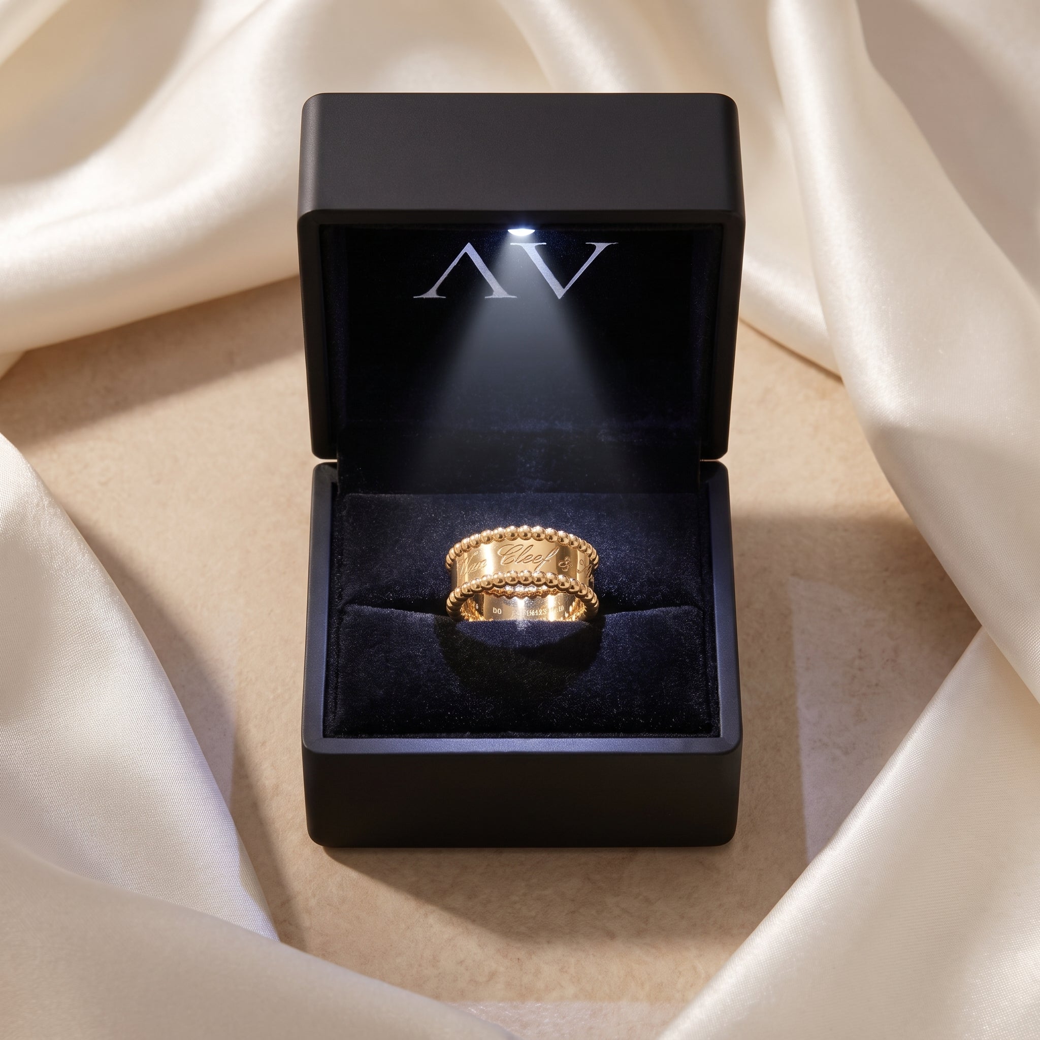 The Vowbound Ring in 18K gold vermeil presented in a premium black lighted jewelry gift box.