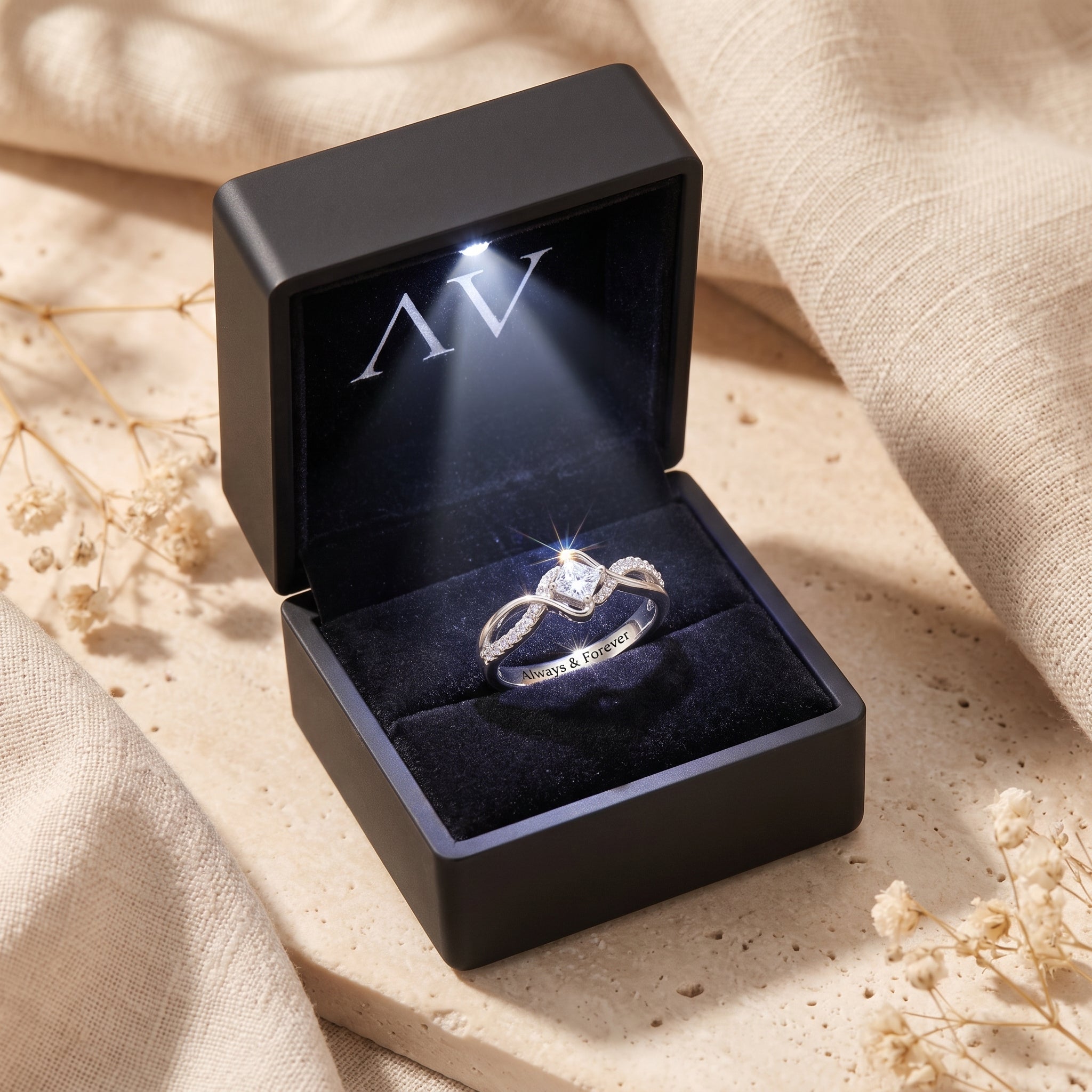 S925 sterling silver moissanite ring inside a black LED-lit presentation box.