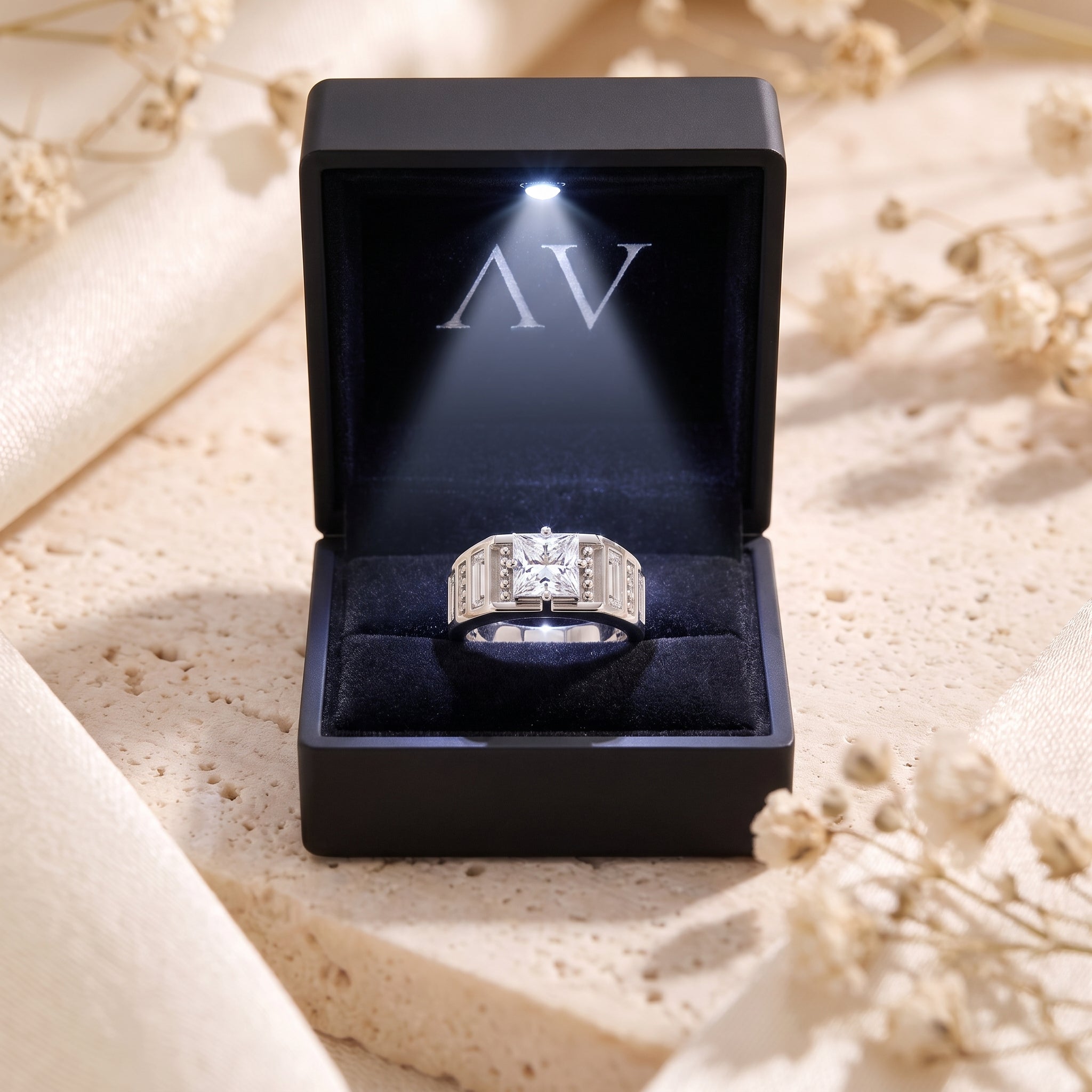 The Carisara princess cut simulated diamond promise ring presented in a black LED-lit jewelry gift box.