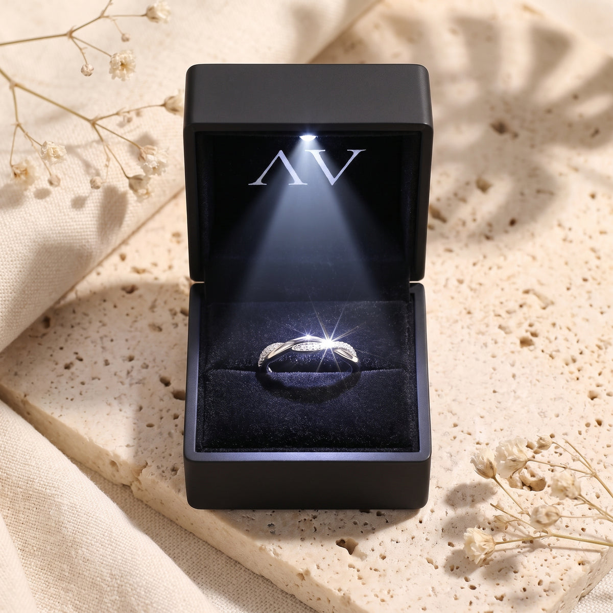 Veronelle silver promise ring presented in a black LED-lighted gift box to highlight the pavé stones.