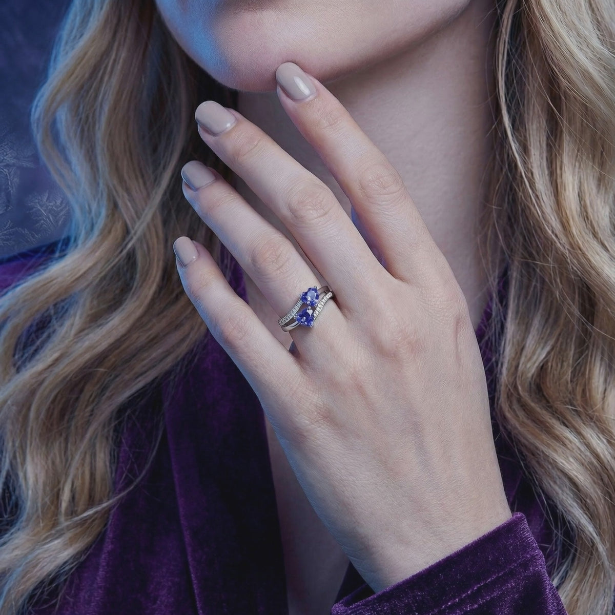 A solid gold ring with simulated tanzanite.